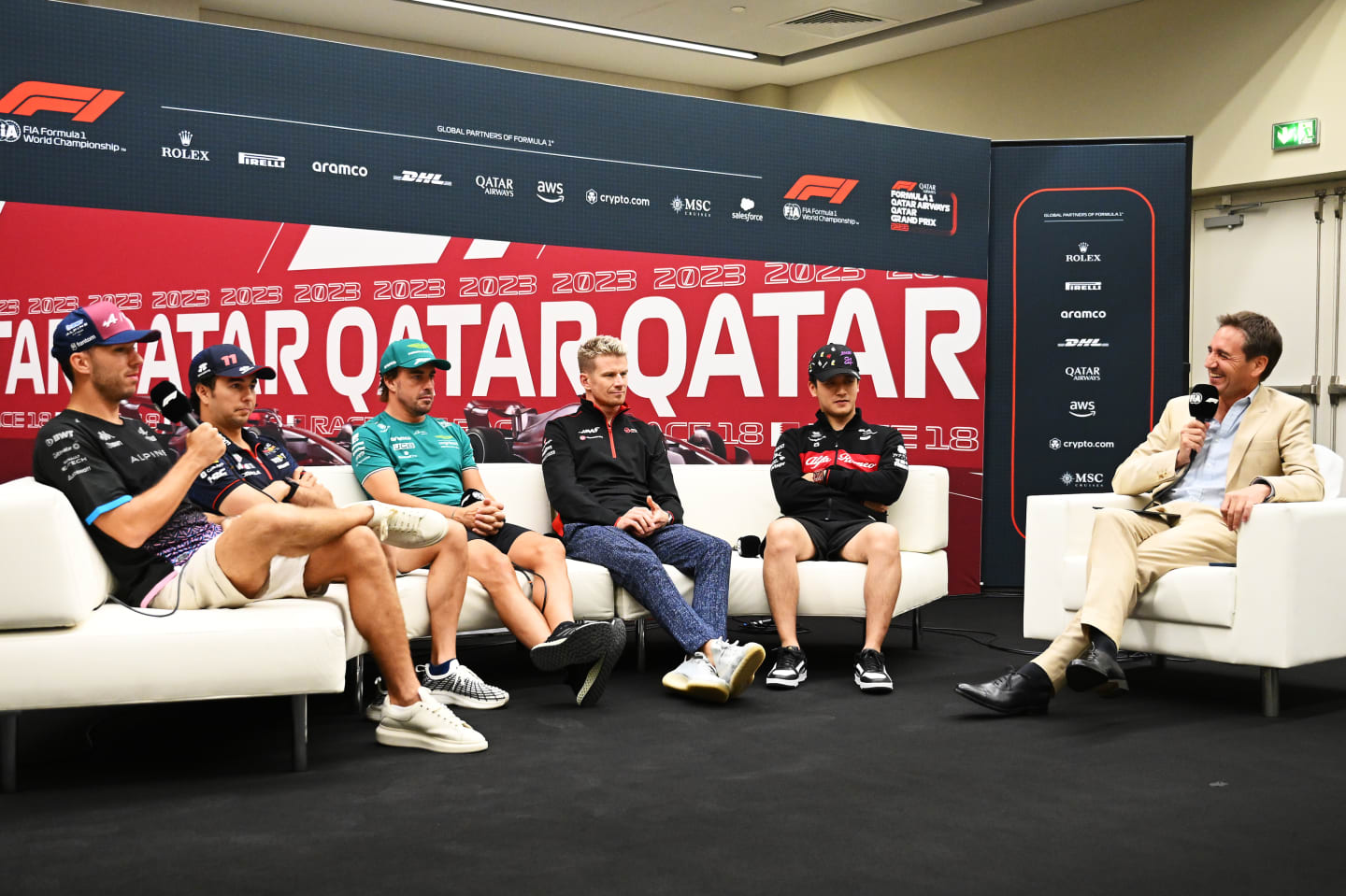 LUSAIL CITY, QATAR - OCTOBER 05: Pierre Gasly of France and Alpine F1, Sergio Perez of Mexico and