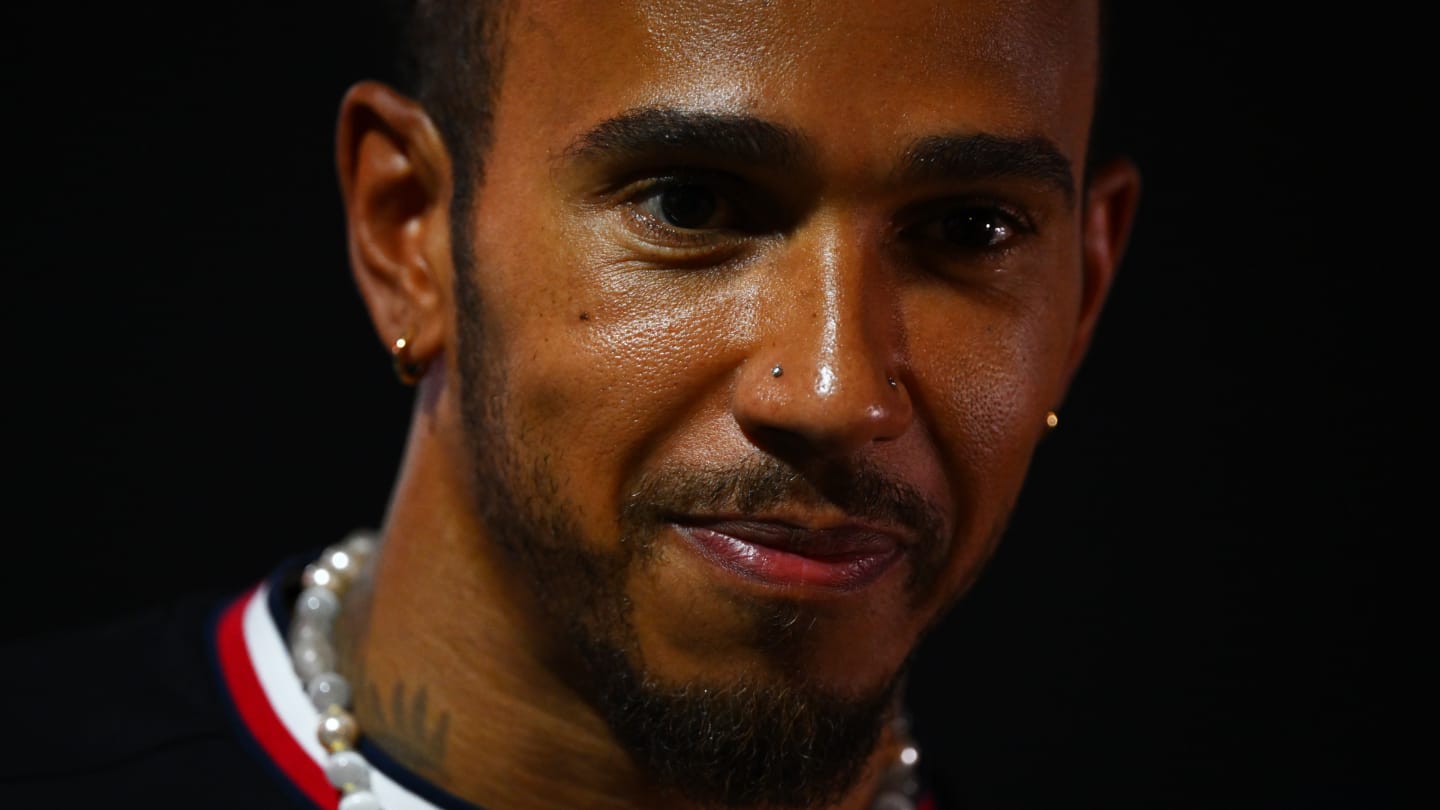 LUSAIL CITY, QATAR - OCTOBER 05: Lewis Hamilton of Great Britain and Mercedes talks to the media in