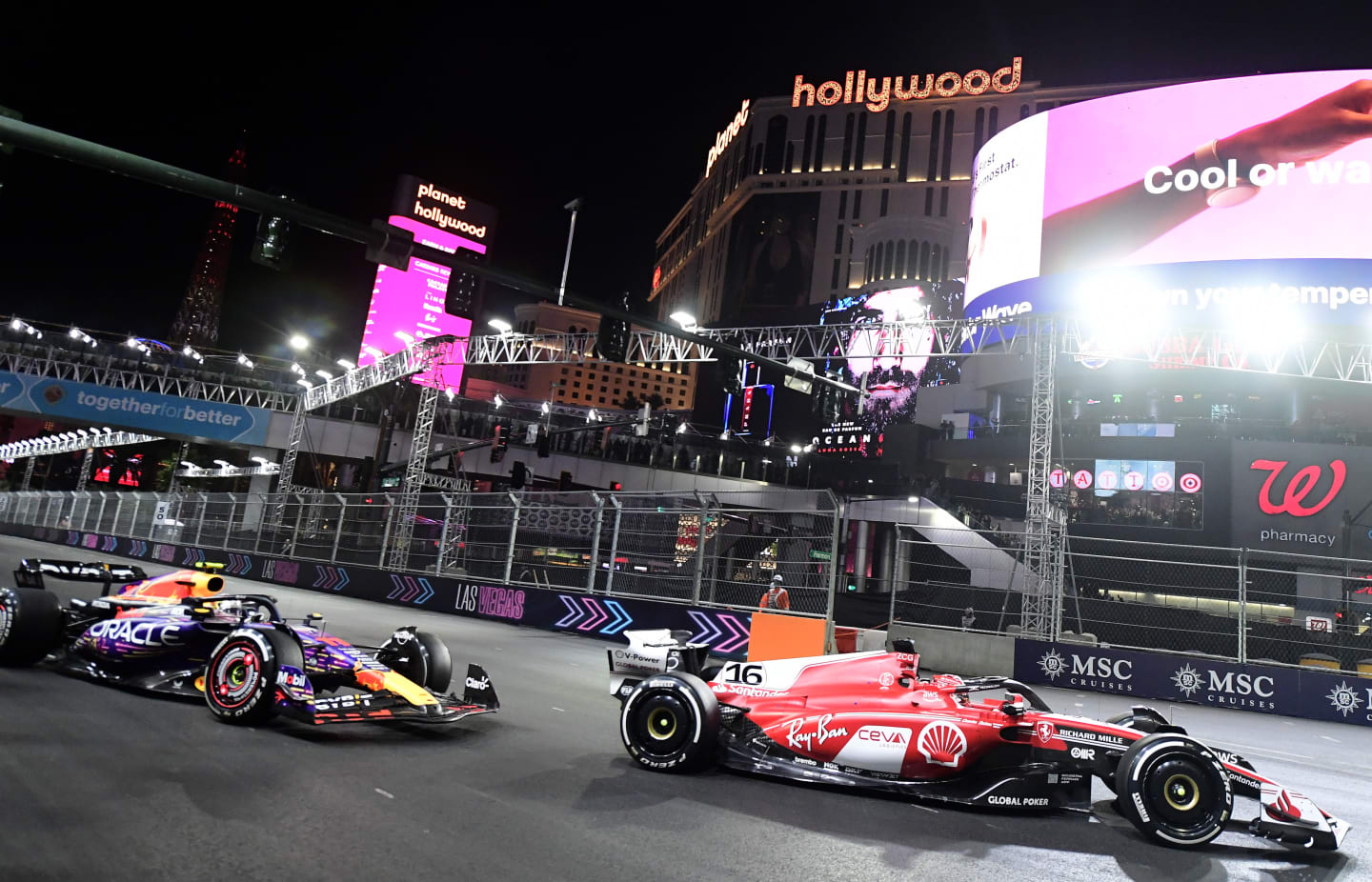 Las Vegas, NV - November 18: Charles Leclerc, right, leads Sergio Perez, left, as they make the