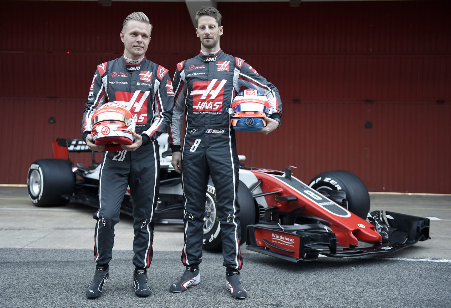HAAS F1 Team's French driver Romain Grosjean (R) and HAAS F1 Team's Danish driver Kevin Magnussen