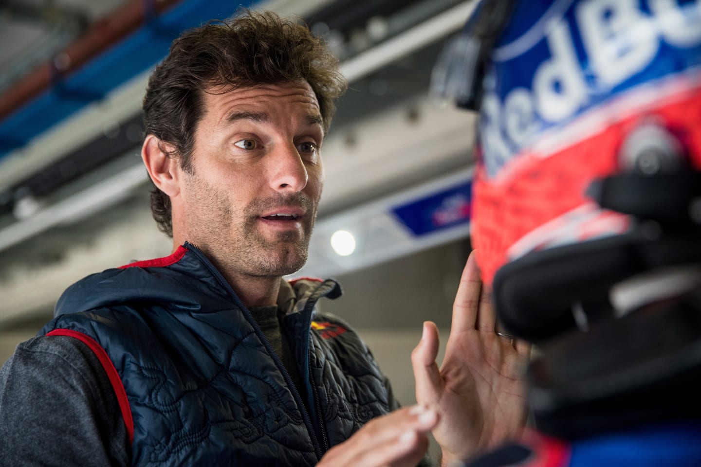SPIELBERG, AUSTRIA - JUNE 05:  Mark Webber of Australia (L) gives instructions to Marc Marquez of