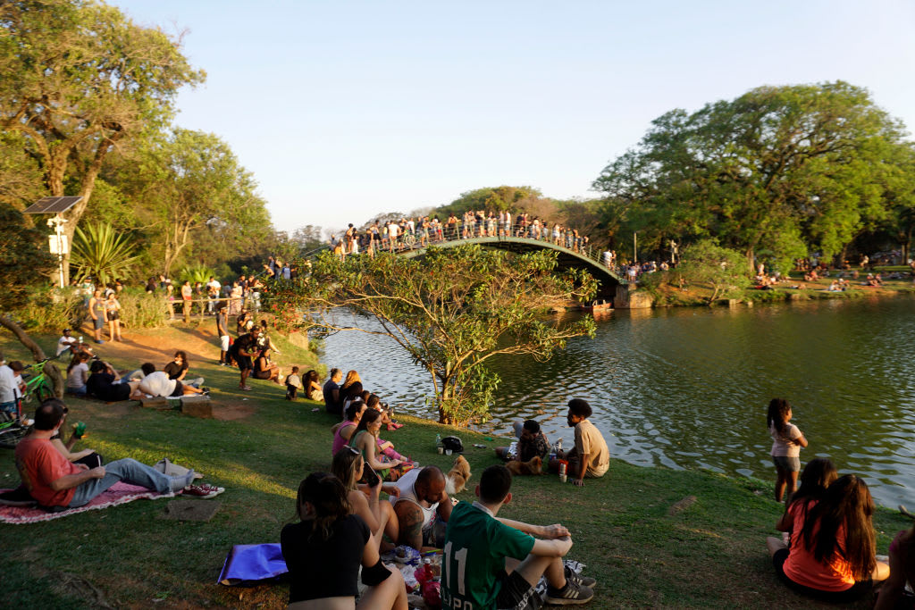 People enjoy a sunny and warm Sunday at Parque do Ibirapuera in Sao Paulo, Brazil, on September 18,