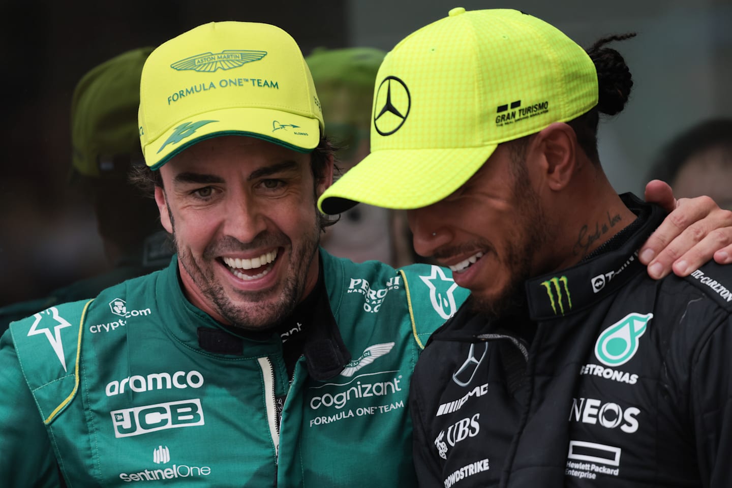 Fernando Alonso of Aston Martin Aramco and Lewis Hamilton of Mercedes after the Formula 1 Grand