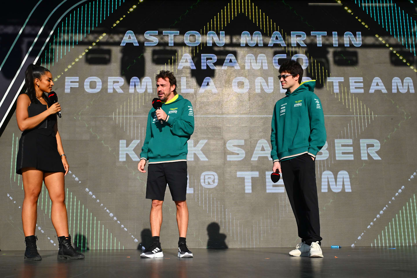 Fernando Alonso, Lance Stroll, Zhou Guanyu and Valtteri Bottas talk to the crowd ahead of the F1 Grand Prix of Qatar at Lusail International Circuit on November 29, 2024 in Lusail City, Qatar. (Photo by Mark Sutton - Formula 1/Formula 1 via Getty Images)