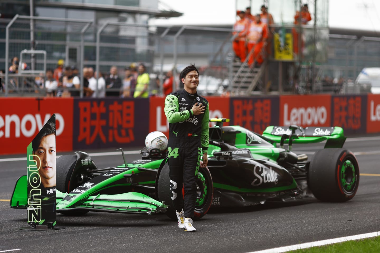 Zhou Guanyu, Stake F1 Team Kick Sauber, acknowledges his home fans from the grid after the race;