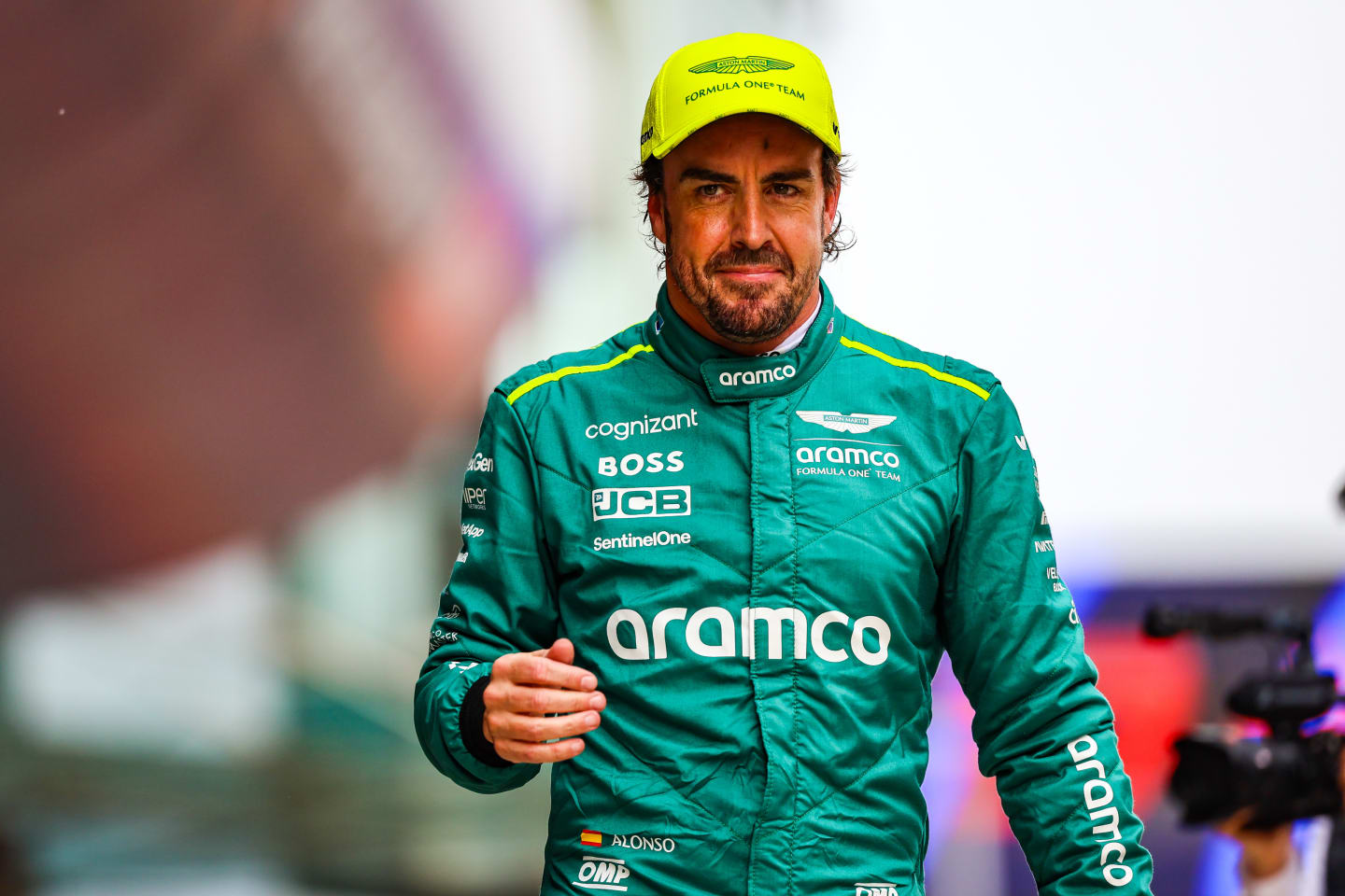 SHANGHAI, CHINA - APRIL 20: Fernando Alonso of Spain and Aston Martin F1 Team walks in parc ferme after qualifying ahead of the F1 Grand Prix of China at Shanghai International Circuit on April 20, 2024 in Shanghai, China. (Photo by Kym Illman/Getty Images)
