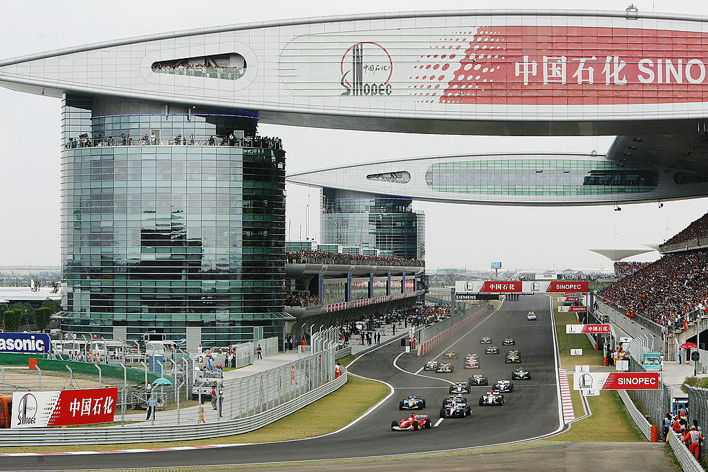 SHANGHAI, CHINA - SEPTEMBER 26:  Rubens Barrichello of Brazil and Ferrari leads into the first