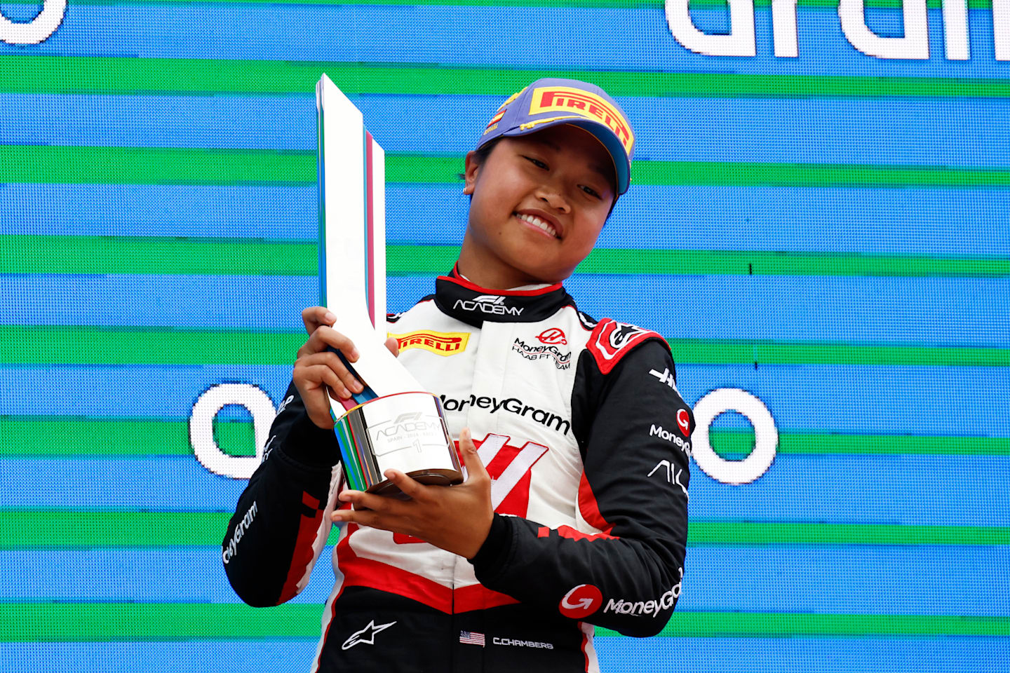 BARCELONA, SPAIN - JUNE 23: Race winner Chloe Chambers of United States and Campos Racing (14) celebrates on the podium after the F1 Academy Round 3 race 2 at Circuit de Barcelona-Catalunya. (Photo by Chris Graythen/Getty Images)