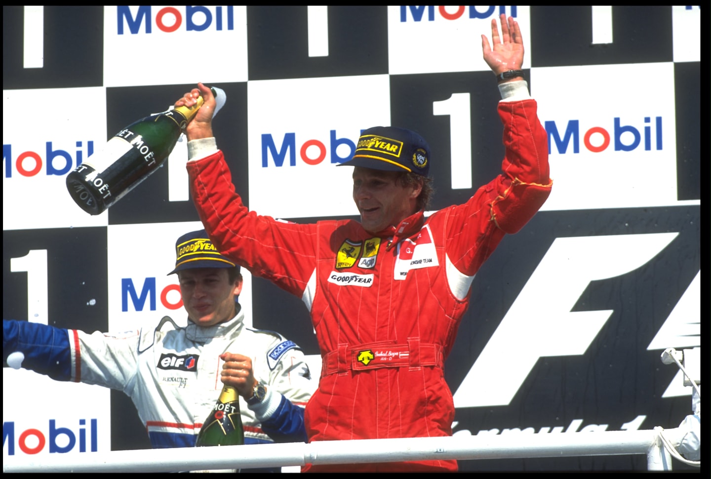 31 JUL 1994:  GERHARD BERGER OF AUSTRIA CELEBRATES HIS VICTORY AFTER WINNING THE GERMAN GRAND PRIX