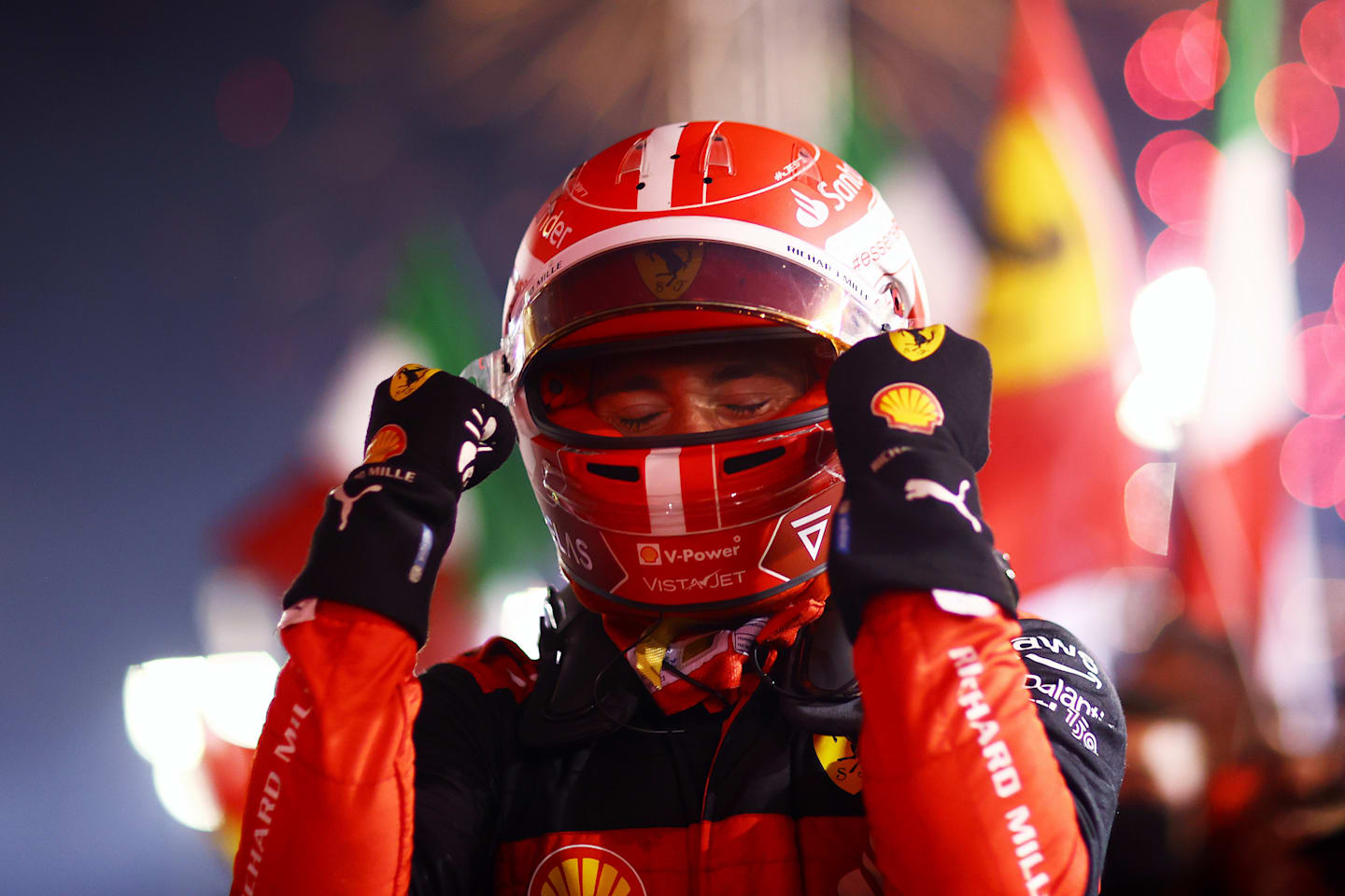 BAHRAIN, BAHRAIN - MARCH 20:  Race winner Charles Leclerc of Monaco and Ferrari celebrates in parc