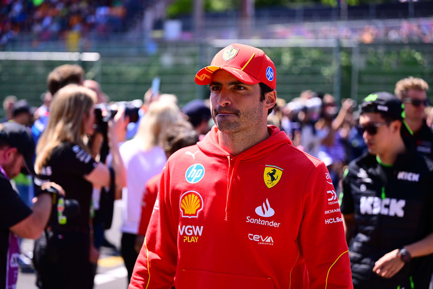 Carlos Sainz of Scuderia Ferrari is walking during the driver's parade during the race of the