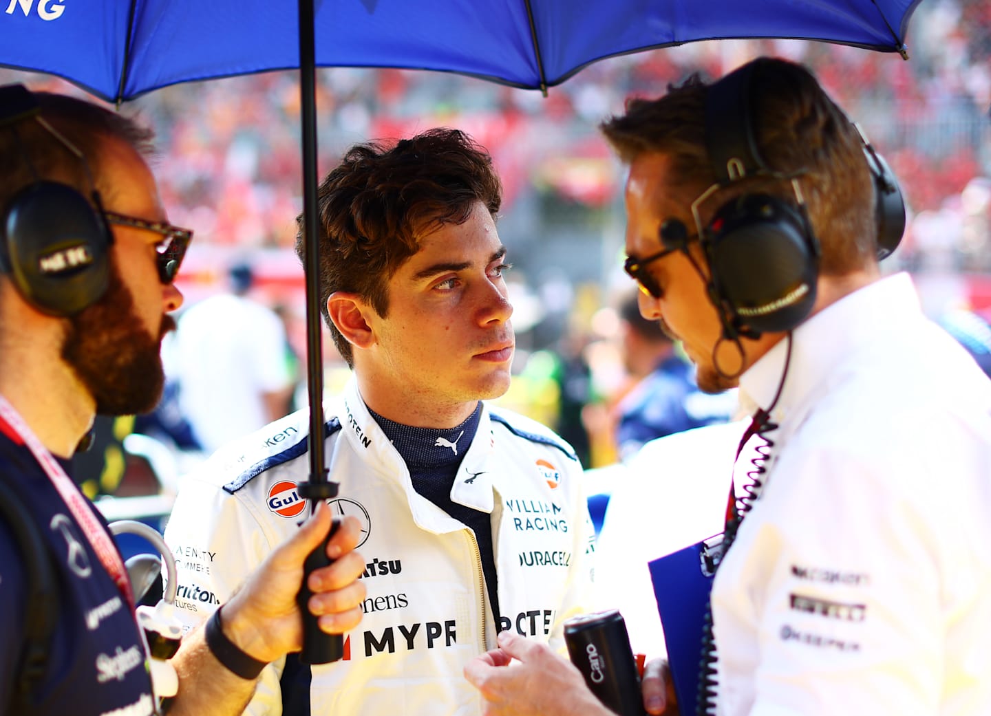 MONZA, ITALY - SEPTEMBER 01: Franco Colapinto of Argentina and Williams talks to WIlliams team