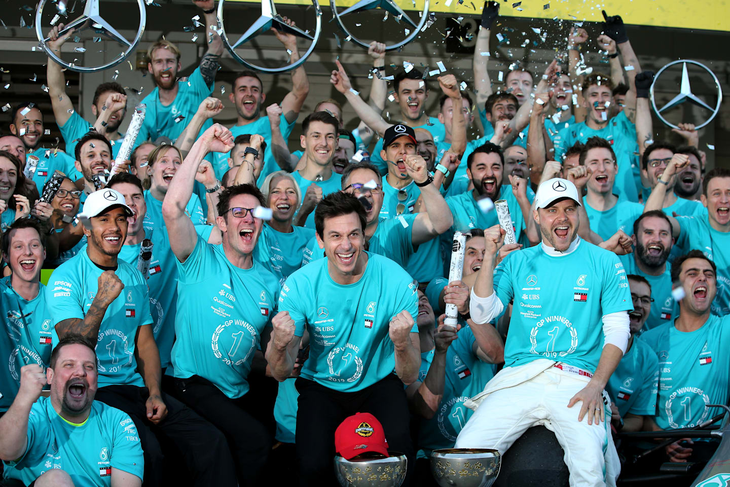 SUZUKA, JAPAN - OCTOBER 13: The Mercedes GP team celebrate winning the constructors championship