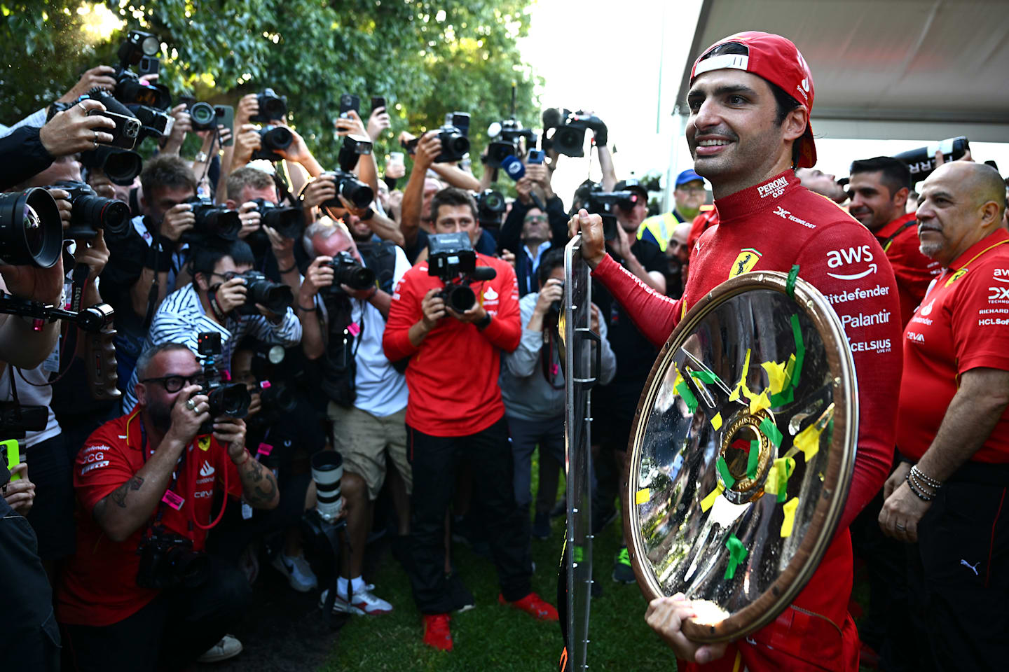MELBOURNE, AUSTRALIA - MARCH 24: Race winner Carlos Sainz of Spain and Ferrari celebrates with his