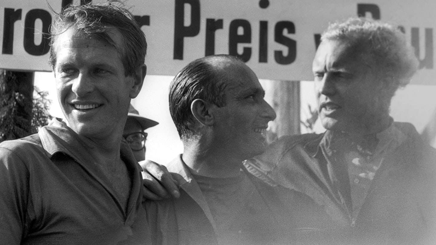 Fangio with Collins (left) and Hawthorn (right) after their thrilling Nurburgring battle