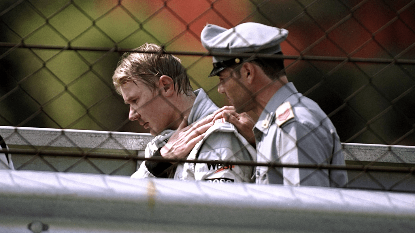 Hakkinen was consoled by one kind official after spinning out of proceedings at Monza