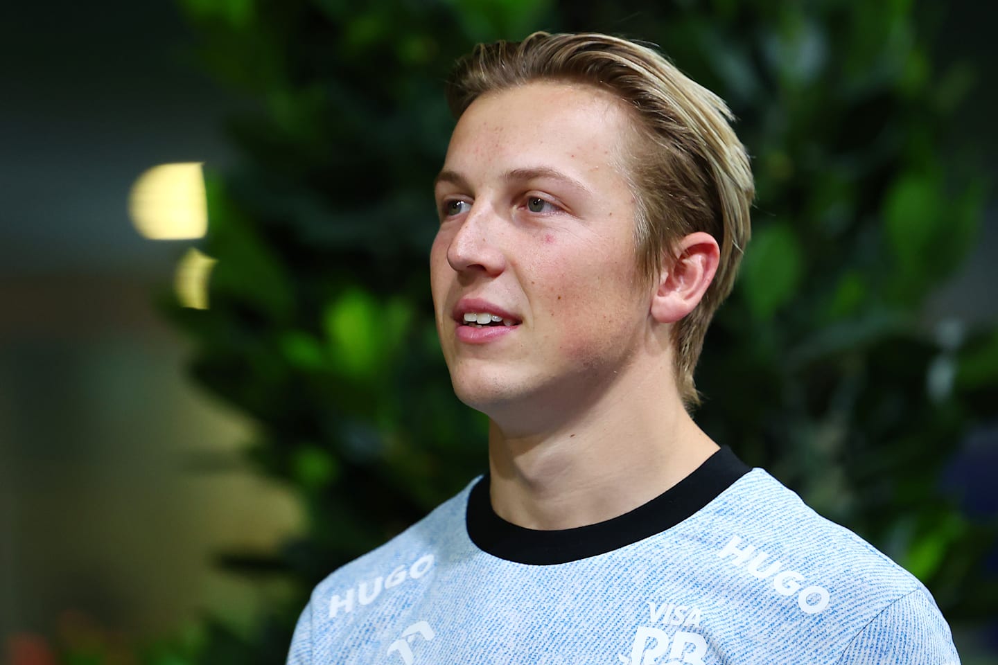 Liam Lawson stands in the paddock during practice ahead of the F1 Grand Prix of Singapore at Marina