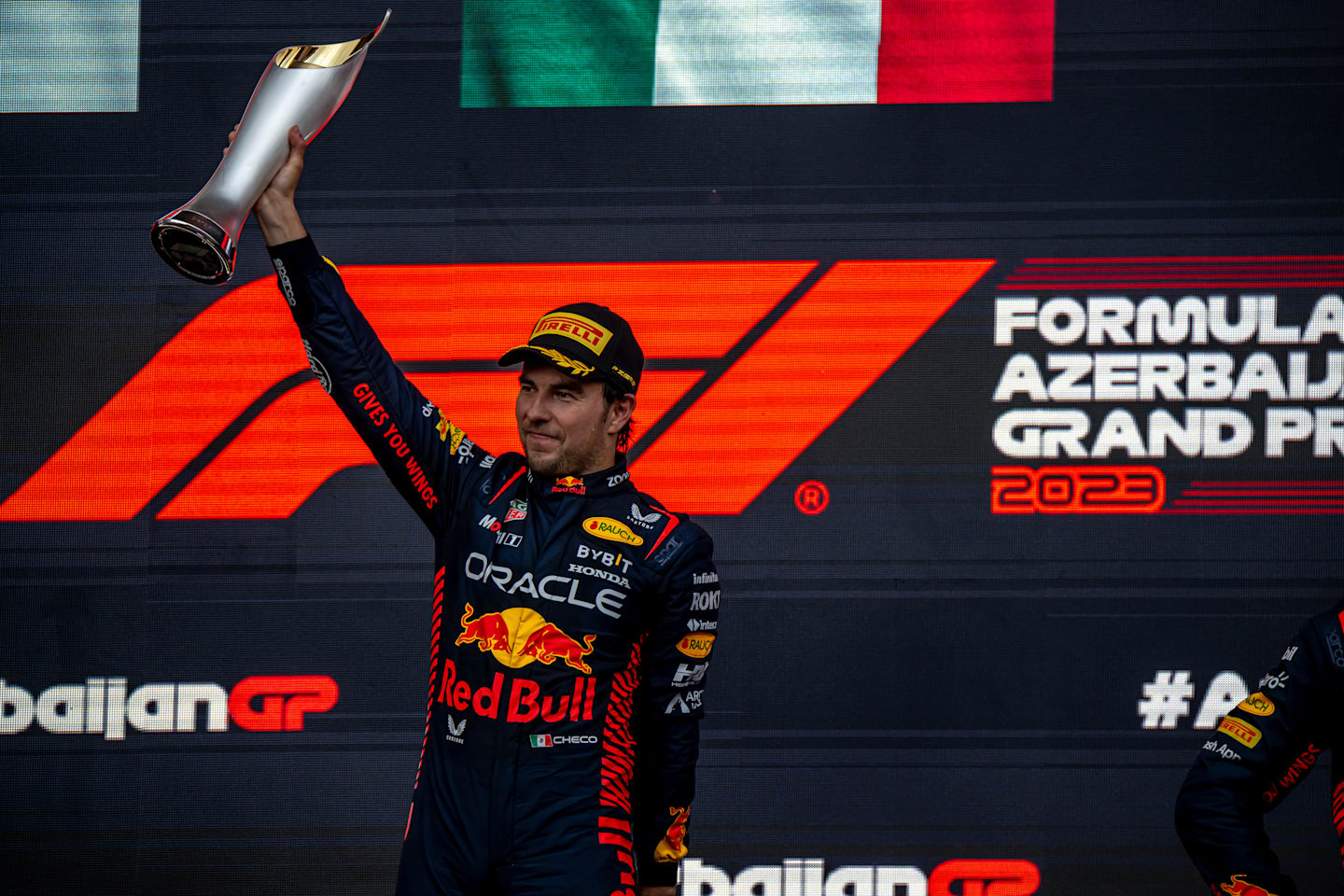 BAKU CITY CIRCUIT, AZERBAIJAN - APRIL 30: Sergio Perez, Red Bull Racing RB19 during the podium