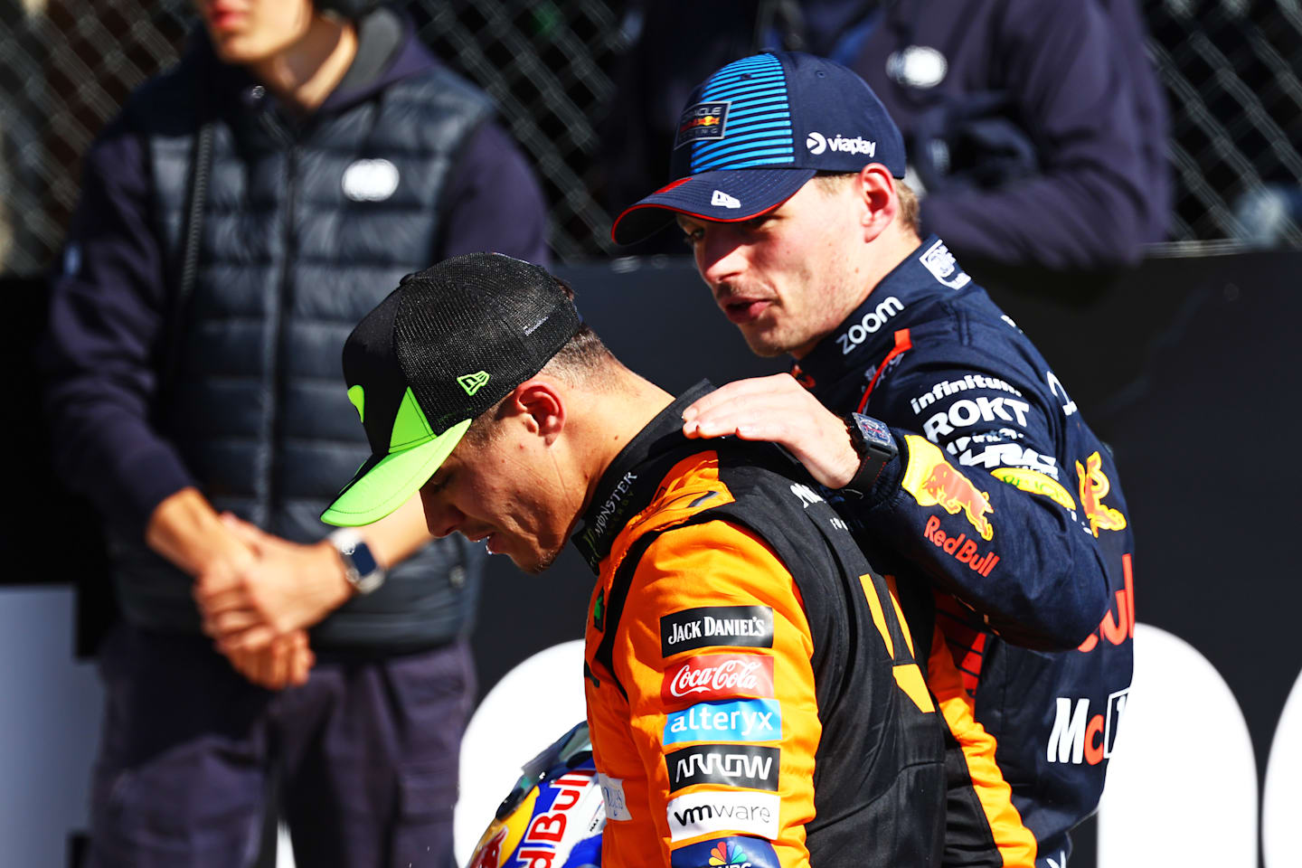 NORTHAMPTON, ENGLAND - JULY 07: Second placed Max Verstappen and Third placed Lando Norris talk in parc ferme during the F1 Grand Prix of Great Britain at Silverstone Circuit on July 07, 2024. (Photo by Mark Thompson/Getty Images)