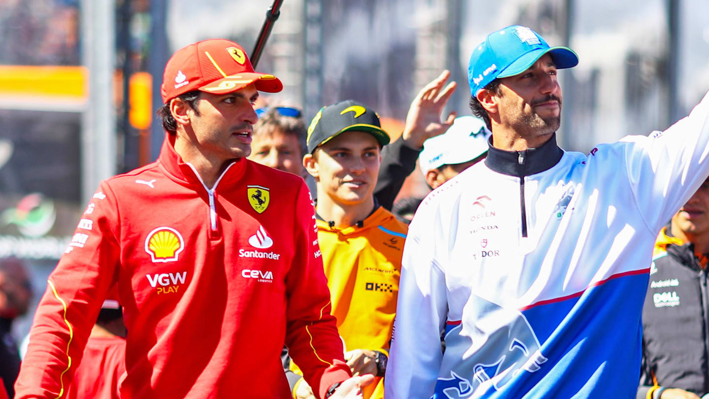 BARCELONA, SPAIN - JUNE 20: Carlos Sainz of Spain and Ferrari and Daniel Ricciardo of Australia and