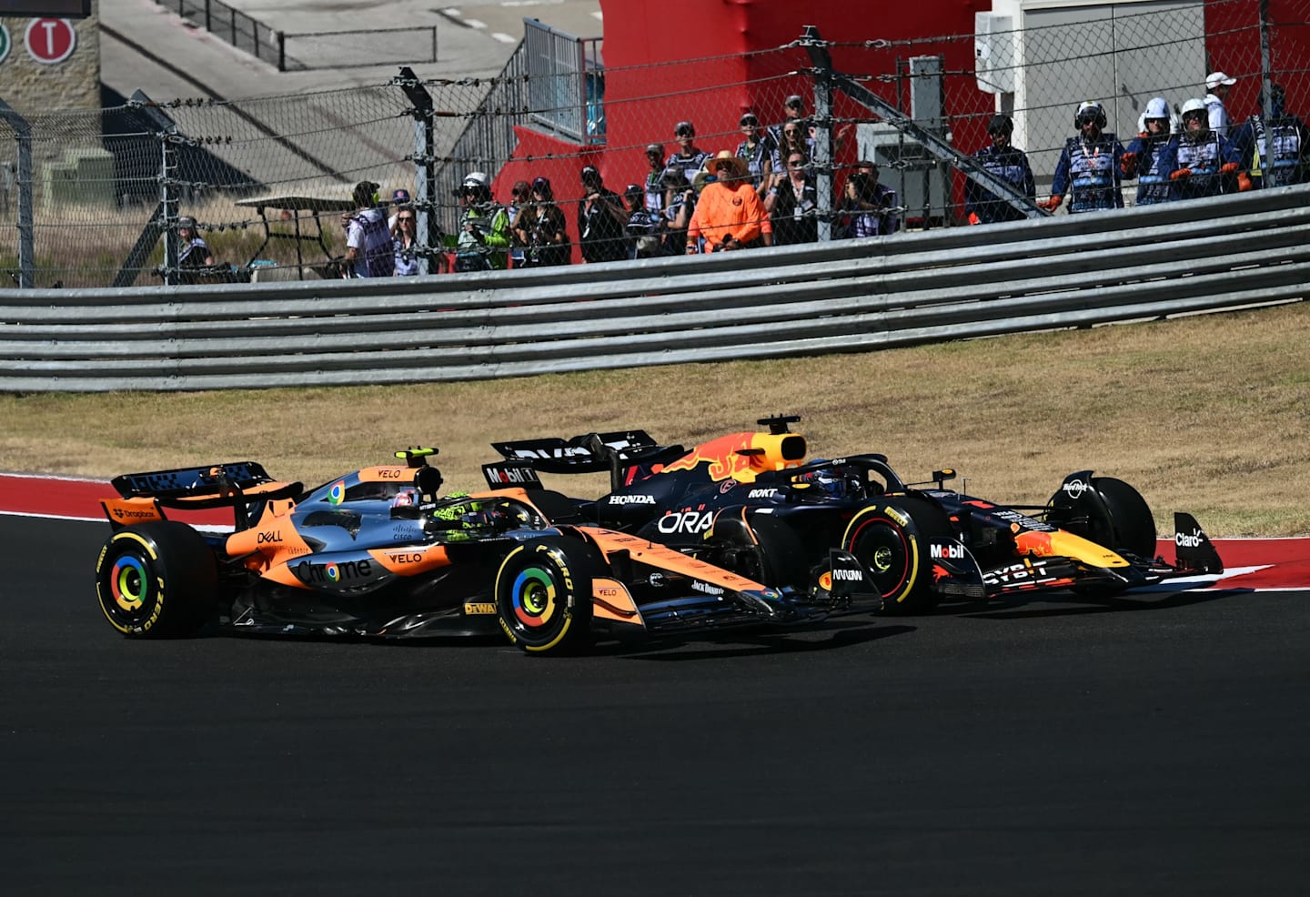 Red Bull Racing's Dutch driver Max Verstappen races ahead of McLaren's British driver Lando Norris during the United States Formula One Grand Prix at the Circuit of the Americas in Austin, Texas, on October 20, 2024. (Photo by ANGELA WEISS / AFP)