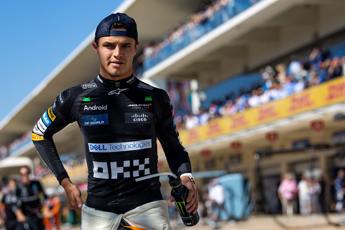 AUSTIN, TEXAS - OCTOBER 20: Lando Norris of Great Britain and McLaren walks to the grid during the F1 Grand Prix of United States at Circuit of The Americas on October 20, 2024 in Austin, United States. (Photo by Kym Illman/Getty Images)