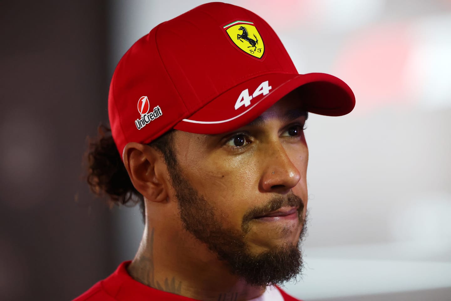 BAHRAIN, BAHRAIN - APRIL 13: Fifth placed Lewis Hamilton of Great Britain and Scuderia Ferrari is