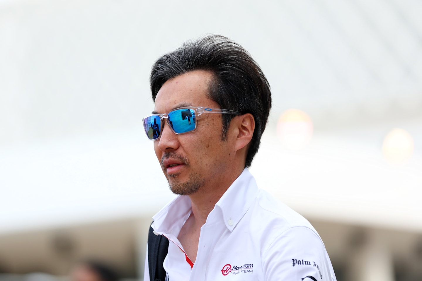 LUSAIL CITY, QATAR - NOVEMBER 28: Haas F1 Team Principal Ayao Komatsu walks in the Paddock during