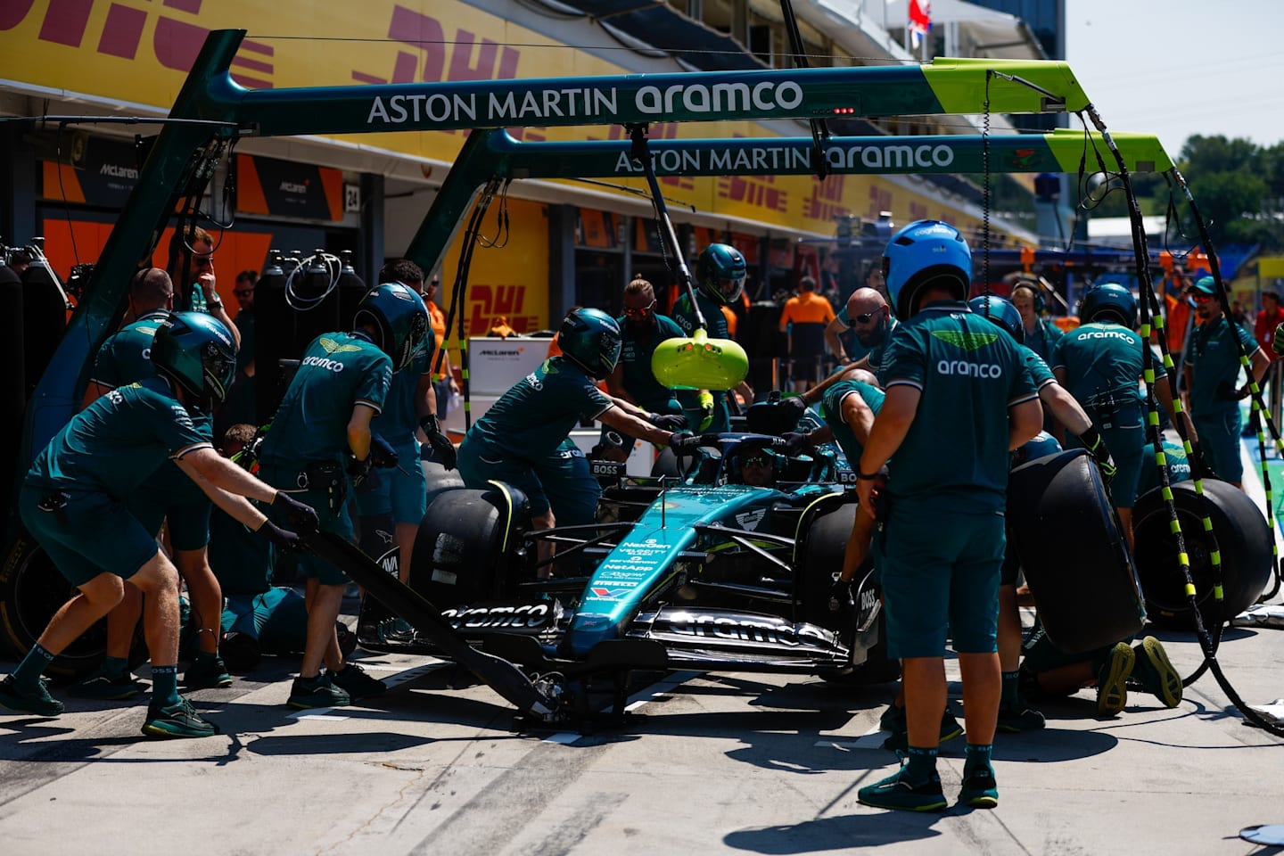 BUDAPEST, HUNGARY - JULY 18: The Aston Martin team practice a pit stop during previews ahead of the