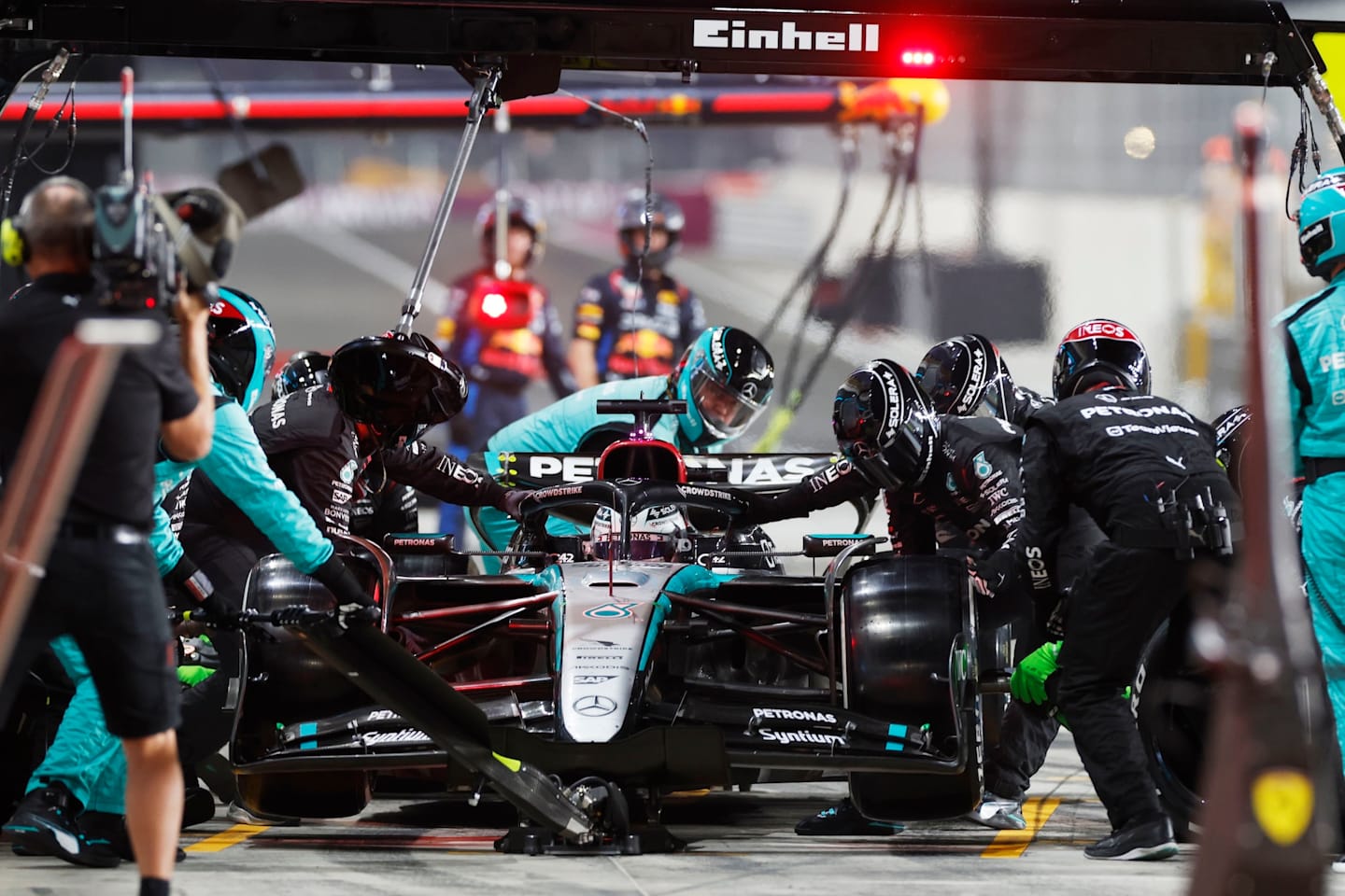 LUSAIL CITY, QATAR - DECEMBER 01: George Russell, Mercedes F1 W15, makes a pit stop during the F1