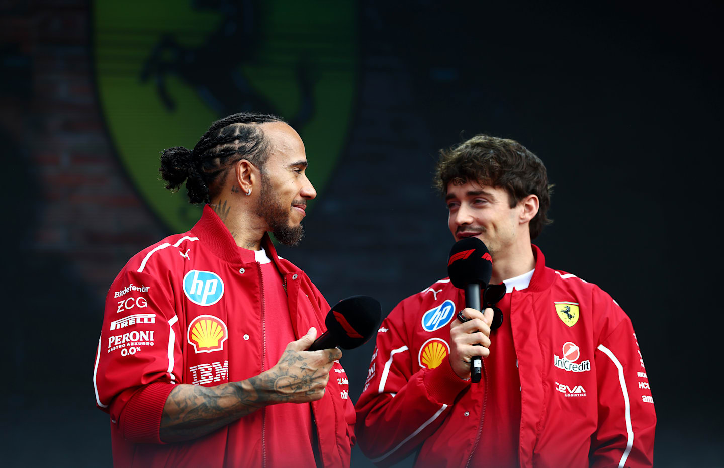 MELBOURNE, AUSTRALIA - MARCH 15: Lewis Hamilton of Great Britain and Scuderia Ferrari and Charles