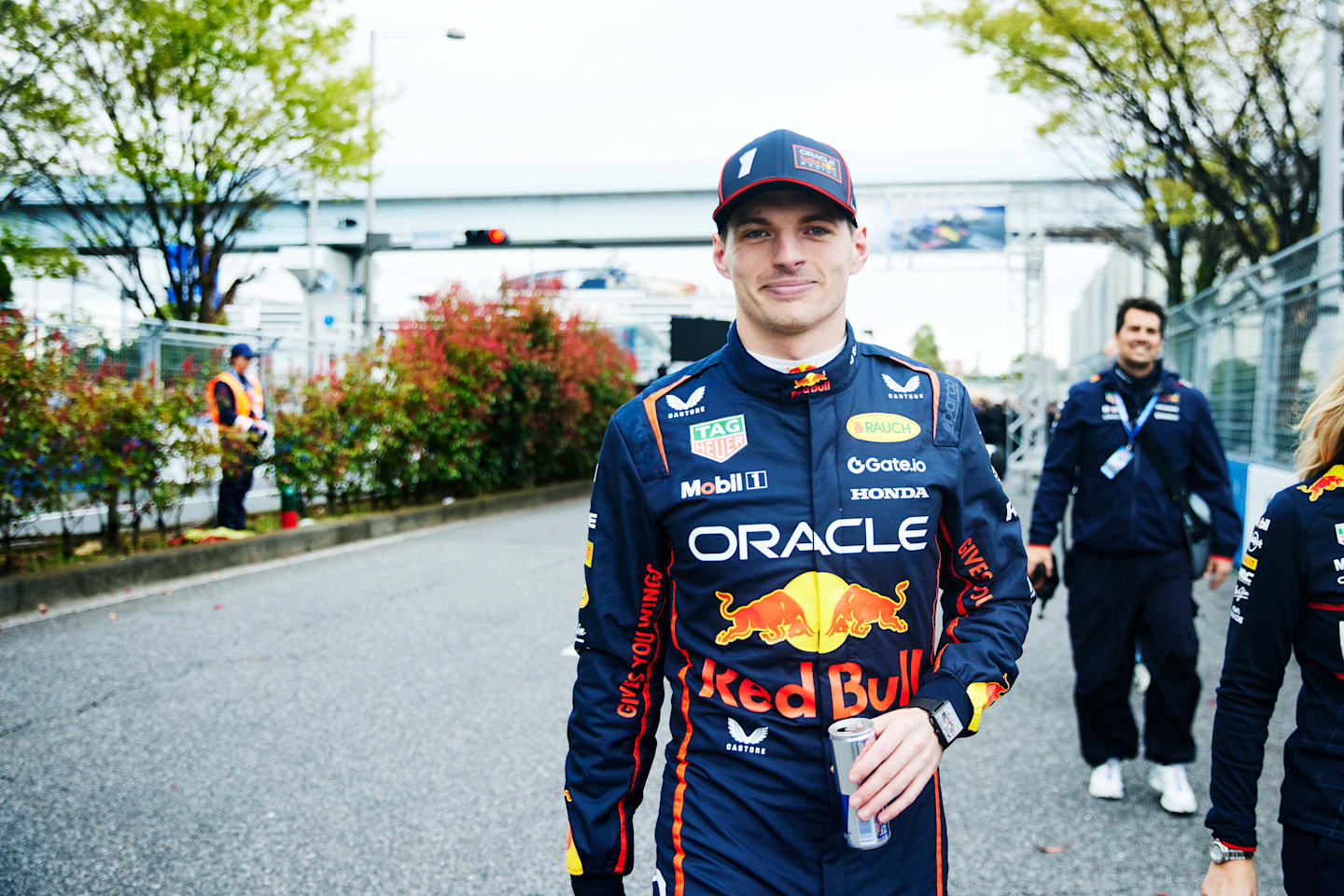 TOKYO, JAPAN - APRIL 02: Yuki Tsunoda of Japan and Oracle Red Bull Racing and Max Verstappen of the