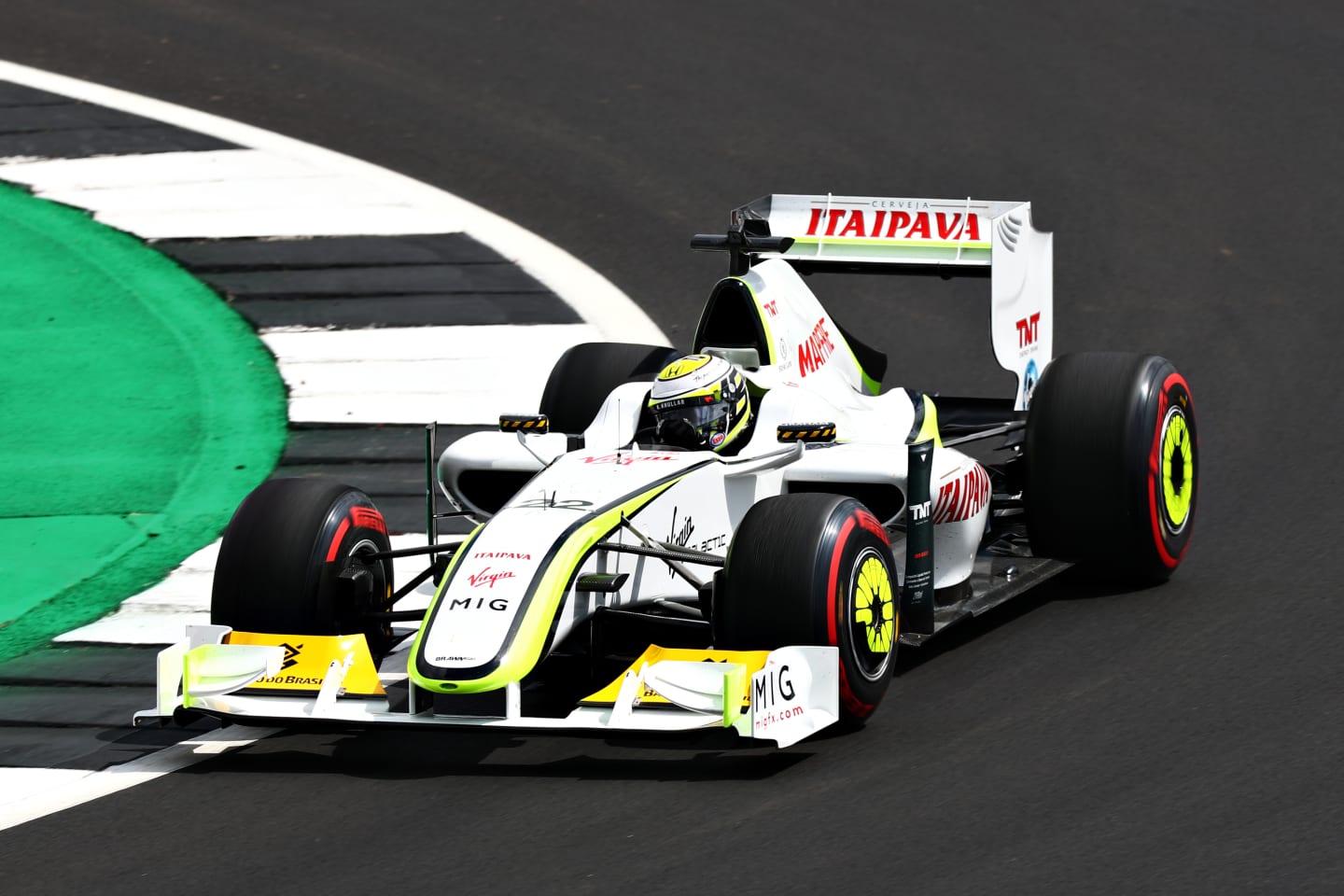 NORTHAMPTON, ENGLAND - JULY 11: Jenson Button of Great Britain drives his Brawn BGP 001 on track