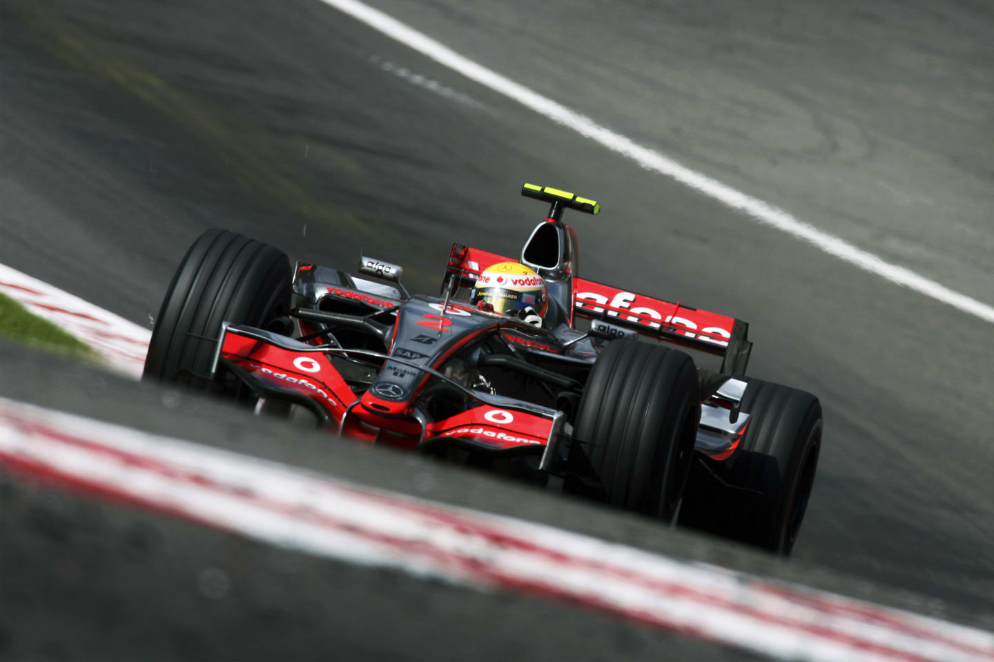 British Formula One driver Lewis Hamilton drives his McLaren MP4-22 V8 Formula One car through the