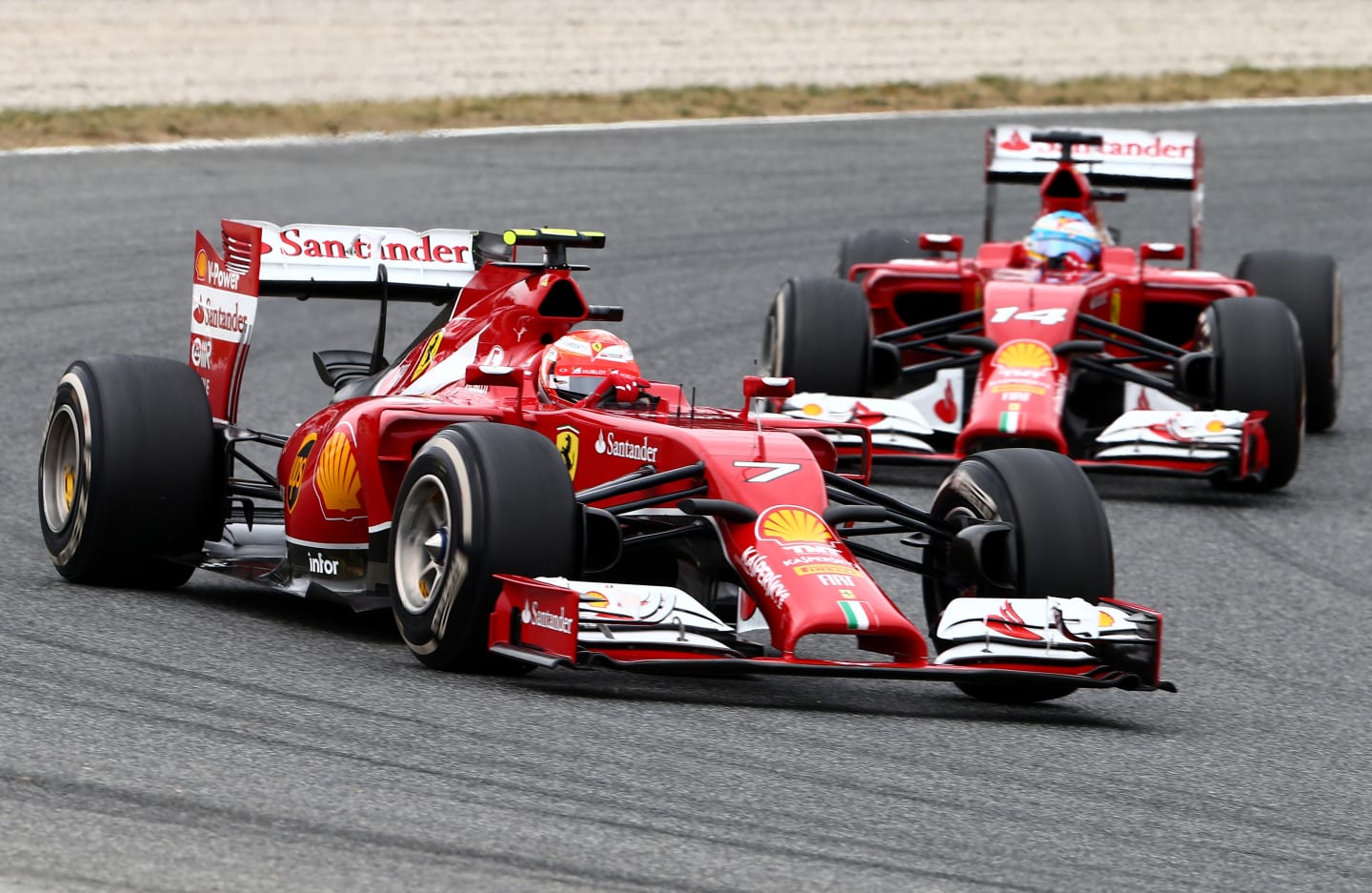 MONTMELO, SPAIN - MAY 11:  Kimi Raikkonen of Finland and Ferrari is followed by teammate Fernando