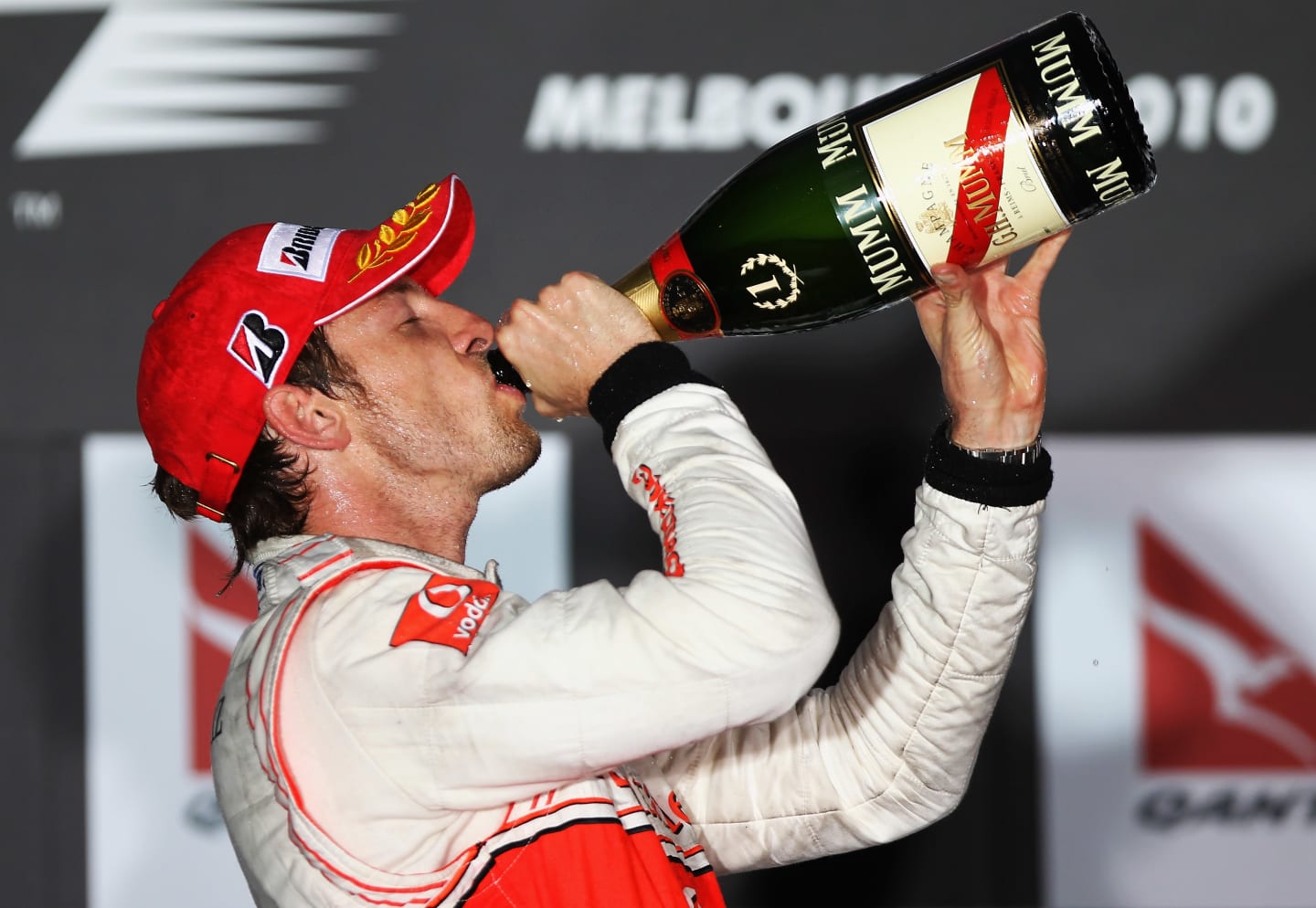 MELBOURNE, AUSTRALIA - MARCH 28:  Jenson Button of Great Britain and McLaren Mercedes celebrates on
