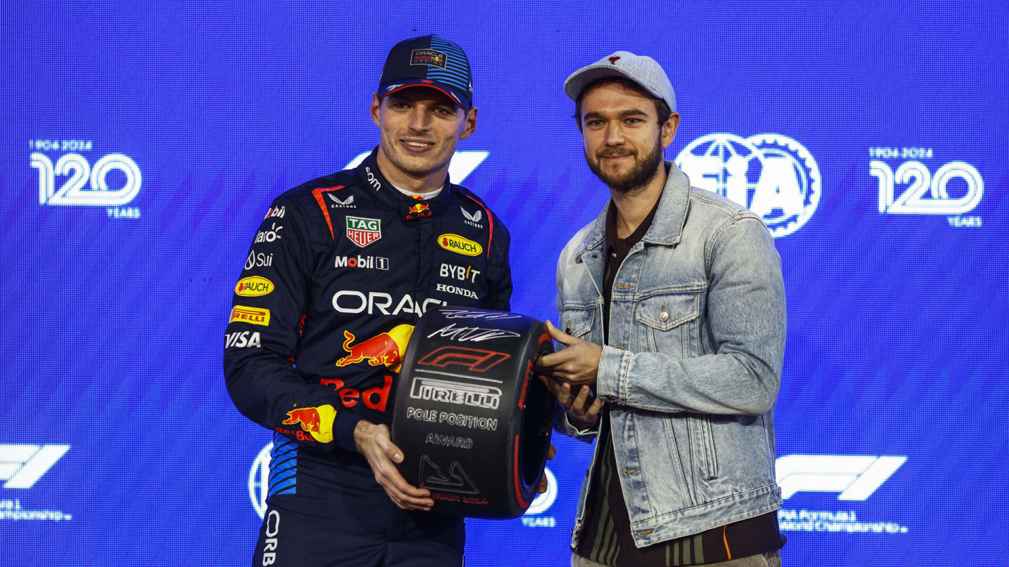 BAHRAIN INTERNATIONAL CIRCUIT, BAHRAIN - MARCH 01: Max Verstappen, Red Bull Racing, receives his