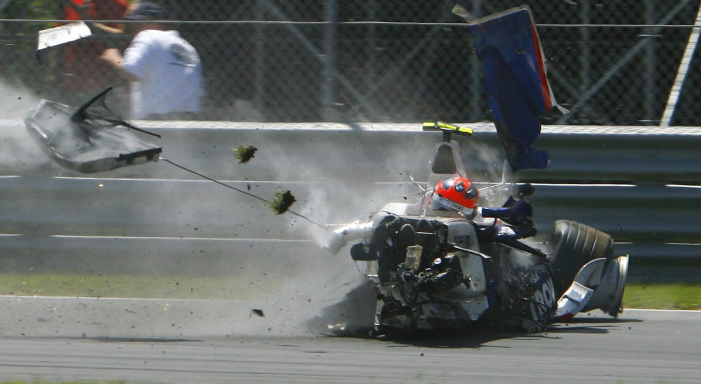 Montreal, CANADA: BMW Sauber driver, Robert Kubica of Poland crashes hard at the hairpin turn
