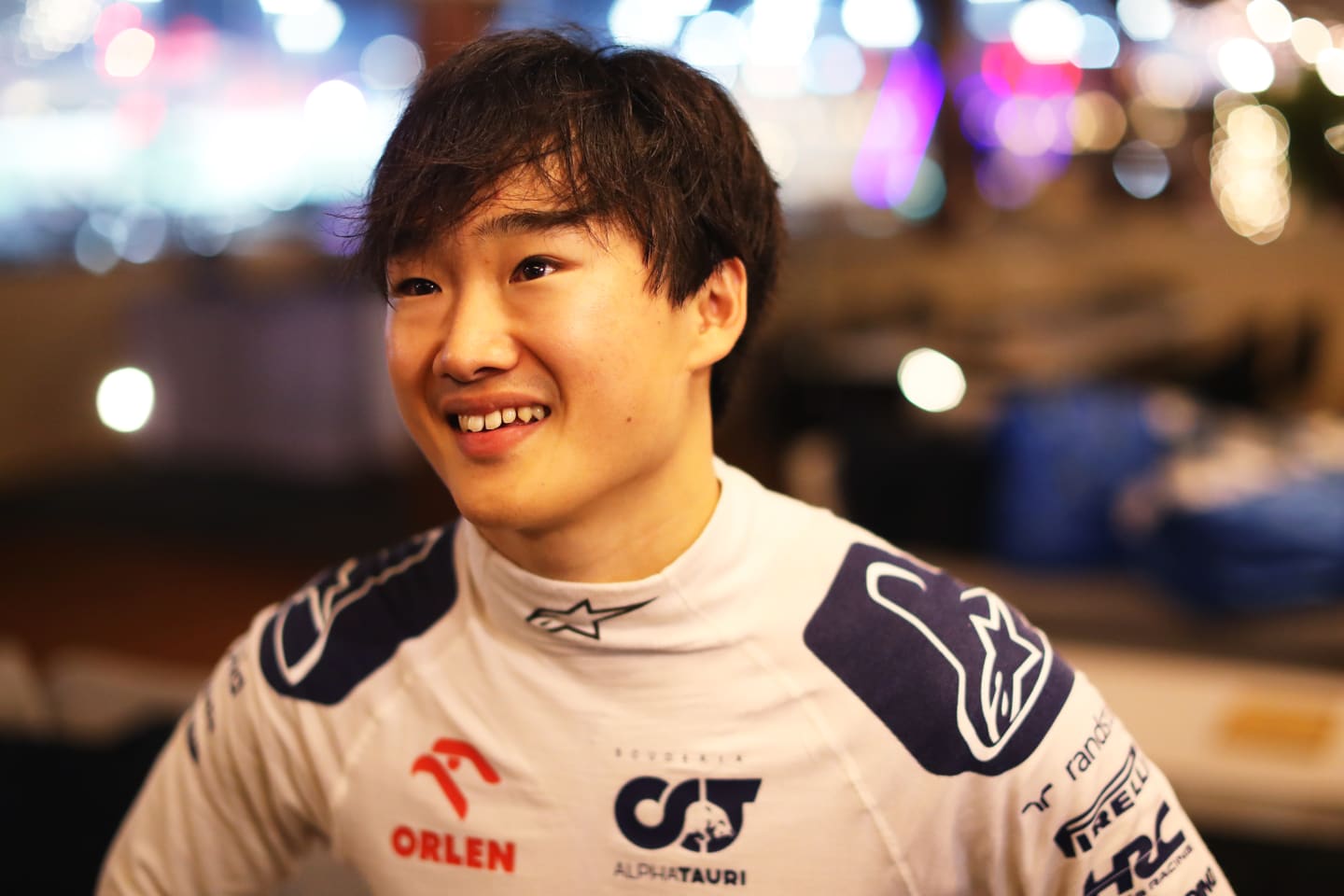 ABU DHABI, UNITED ARAB EMIRATES - NOVEMBER 26: 8th placed Yuki Tsunoda of Japan and Scuderia