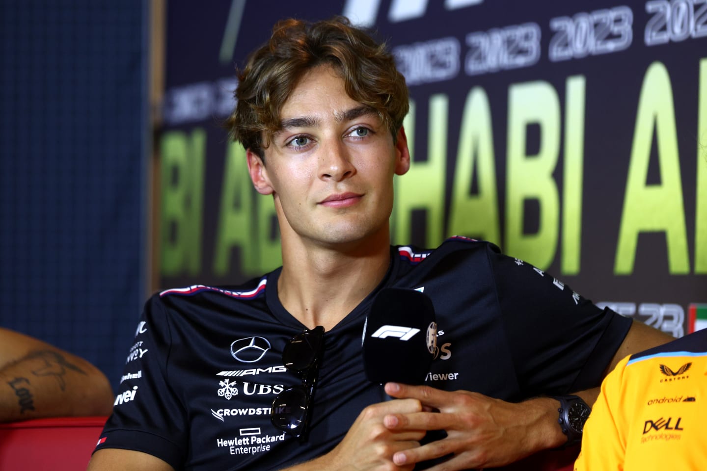 ABU DHABI, UNITED ARAB EMIRATES - NOVEMBER 23: George Russell of Great Britain and Mercedes attends the Drivers Press Conference during previews ahead of the F1 Grand Prix of Abu Dhabi at Yas Marina Circuit on November 23, 2023 in Abu Dhabi, United Arab Emirates. (Photo by Clive Rose/Getty Images)