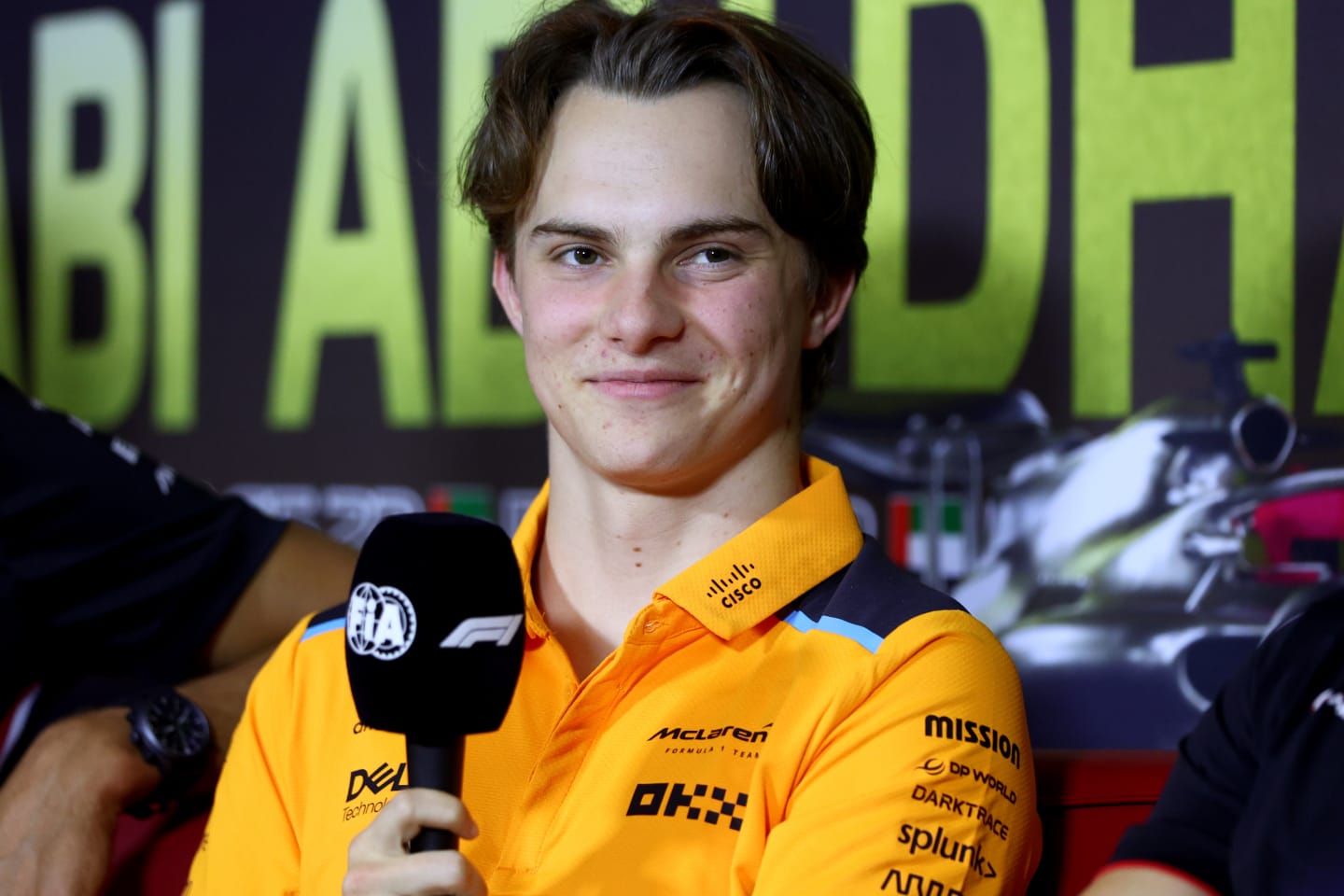 ABU DHABI, UNITED ARAB EMIRATES - NOVEMBER 23: Oscar Piastri of Australia and McLaren attends the Drivers Press Conference during previews ahead of the F1 Grand Prix of Abu Dhabi at Yas Marina Circuit on November 23, 2023 in Abu Dhabi, United Arab Emirates. (Photo by Clive Rose/Getty Images)