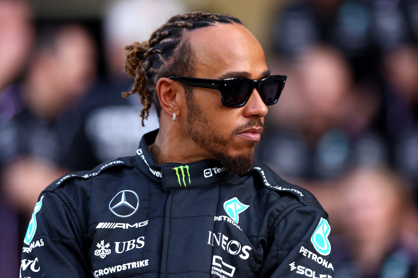 ABU DHABI, UNITED ARAB EMIRATES - NOVEMBER 23: Lewis Hamilton of Great Britain and Mercedes looks