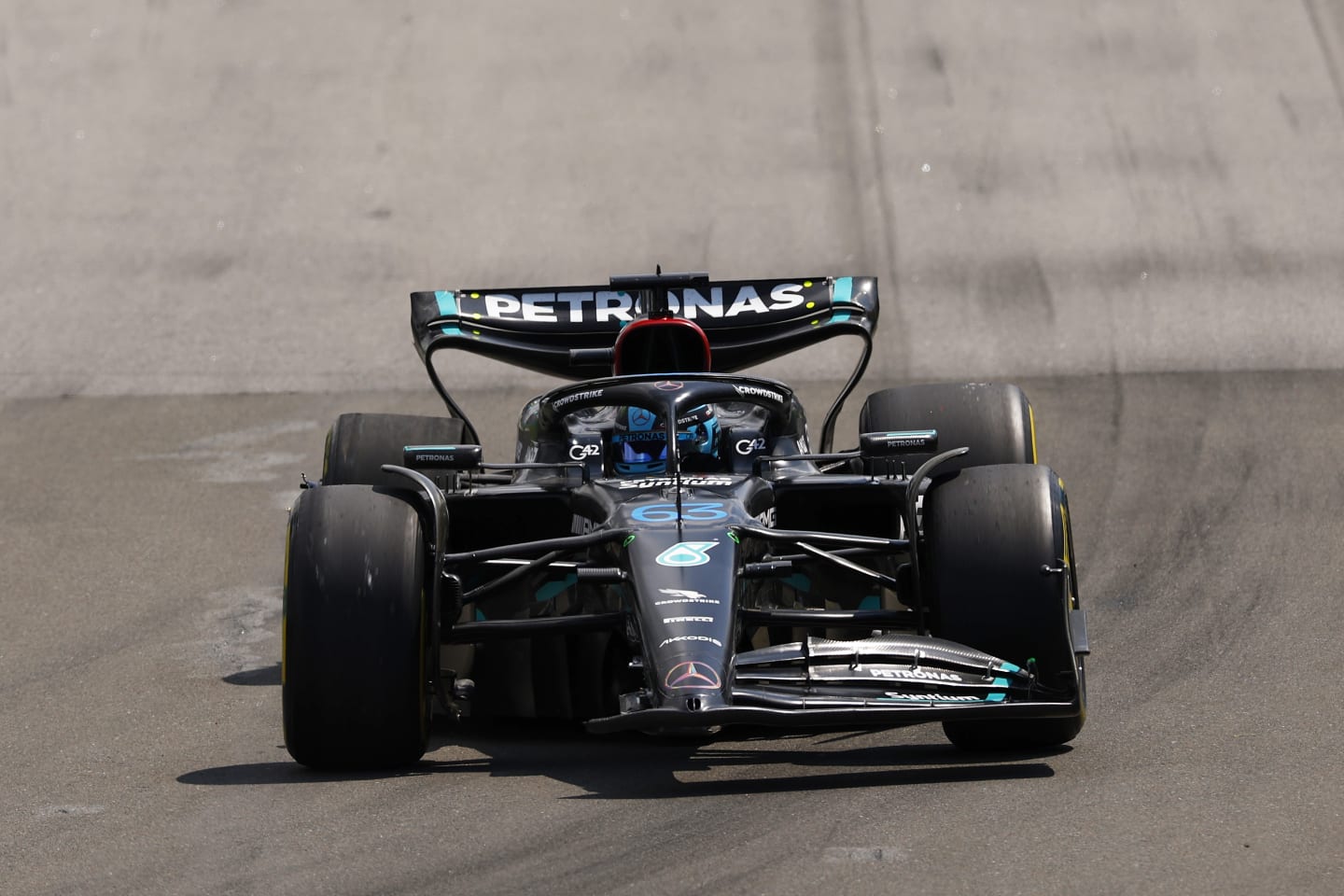MONTREAL, QUEBEC - JUNE 18: George Russell of Great Britain driving the (63) Mercedes AMG Petronas F1 Team W14 with a broken front wing  after a crash on track with a broken front wing during the F1 Grand Prix of Canada at Circuit Gilles Villeneuve on June 18, 2023 in Montreal, Quebec. (Photo by Jared C. Tilton/Getty Images)