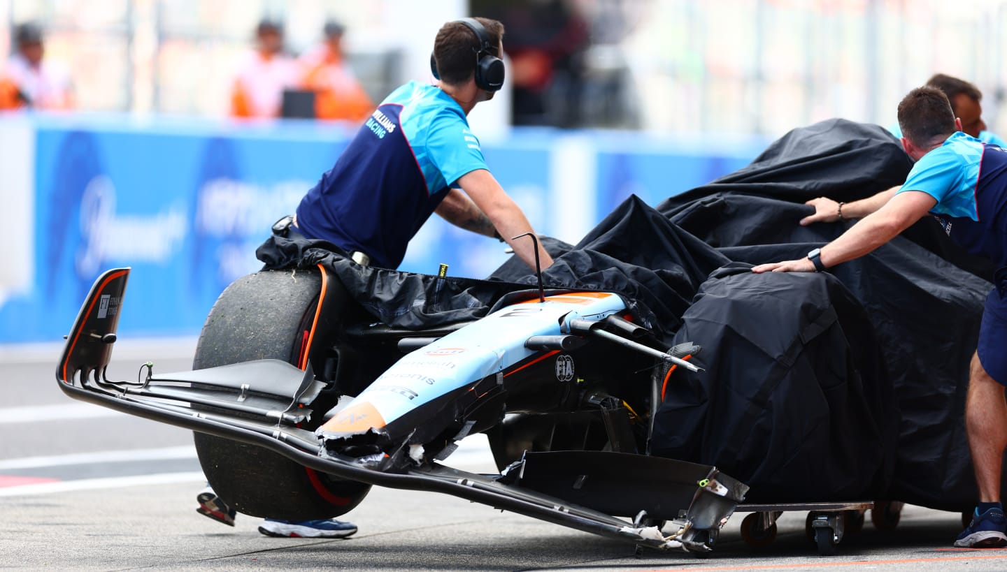 SUZUKA, JAPAN - SEPTEMBER 23: The car of Logan Sargeant of United States and Williams is pushed
