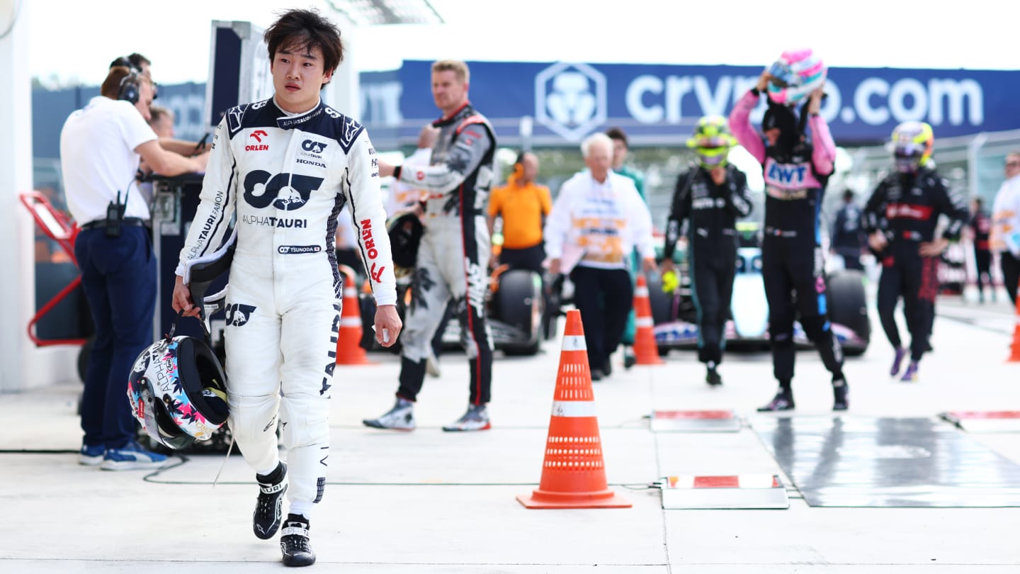 MIAMI, FLORIDA - MAY 07: Yuki Tsunoda of Japan and Scuderia AlphaTauri looks on in parc ferme