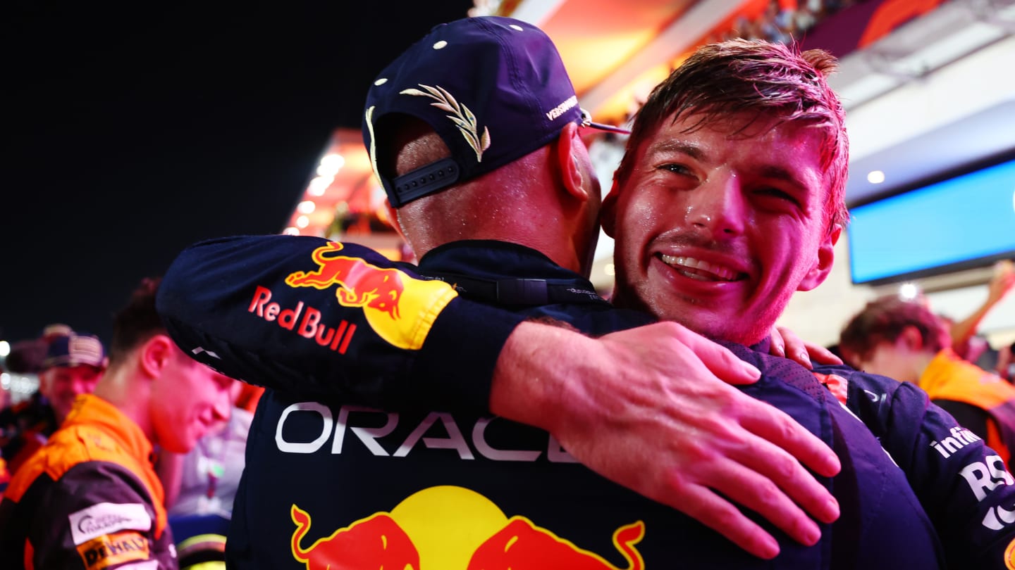 LUSAIL CITY, QATAR - OCTOBER 07: 2023 F1 World Drivers Champion Max Verstappen of the Netherlands and Oracle Red Bull Racing celebrates with a Red Bull Racing team member in parc ferme after the Sprint ahead of the F1 Grand Prix of Qatar at Lusail International Circuit on October 07, 2023 in Lusail City, Qatar. (Photo by Dan Istitene - Formula 1/Formula 1 via Getty Images)