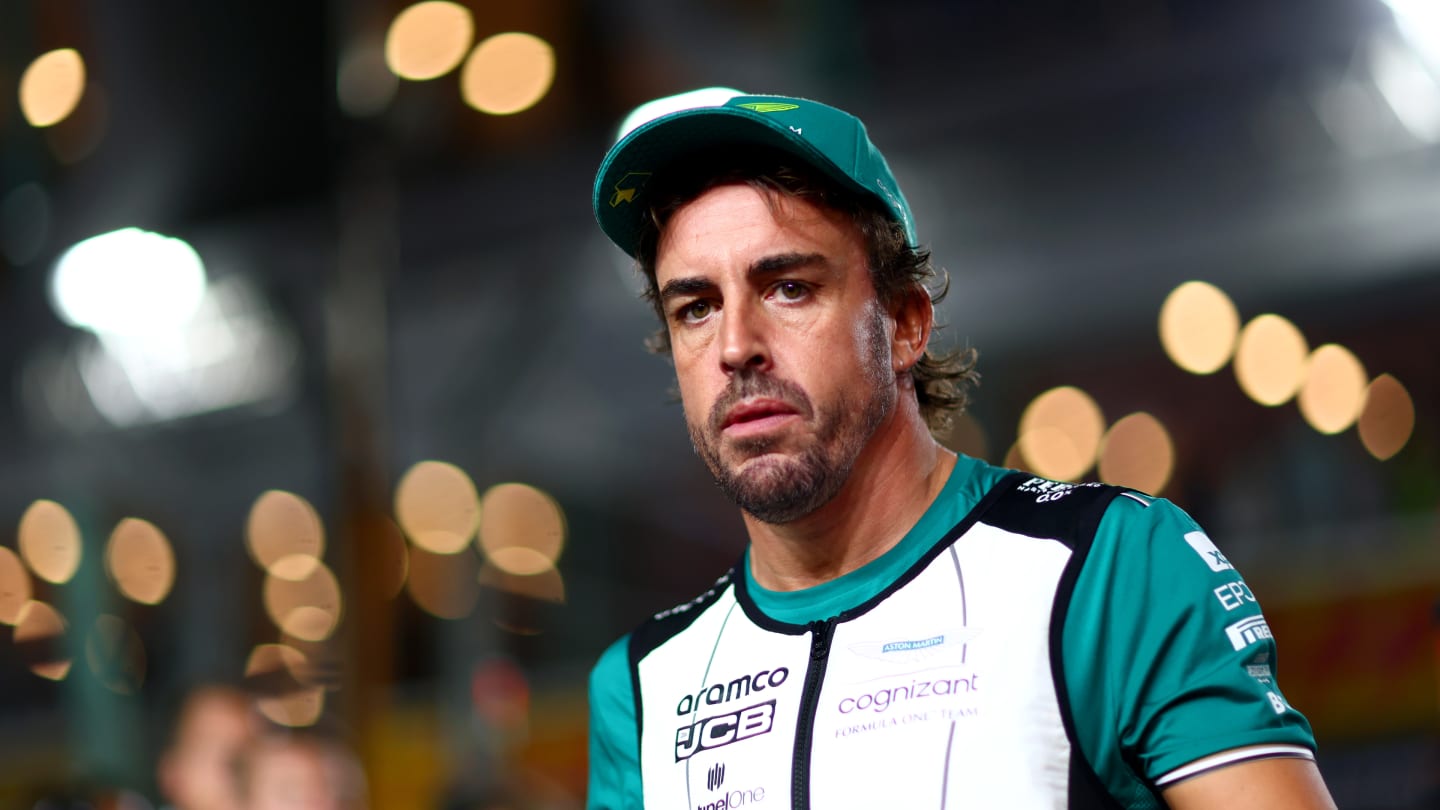 SINGAPORE, SINGAPORE - SEPTEMBER 17: Fernando Alonso of Spain and Aston Martin F1 Team looks on from the grid prior to the F1 Grand Prix of Singapore at Marina Bay Street Circuit on September 17, 2023 in Singapore, Singapore. (Photo by Dan Istitene - Formula 1/Formula 1 via Getty Images)
