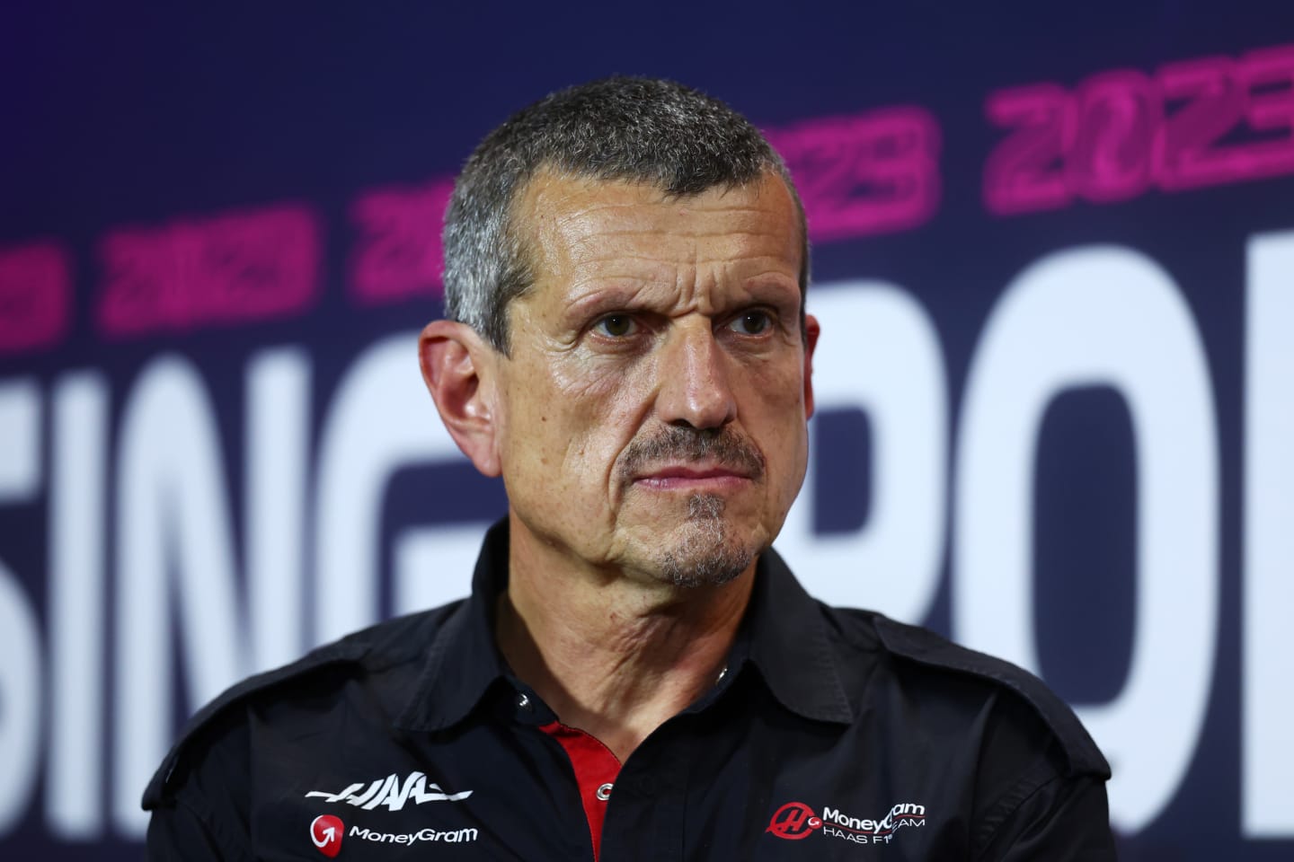 SINGAPORE, SINGAPORE - SEPTEMBER 15: Haas F1 Team Principal Guenther Steiner talks in the team