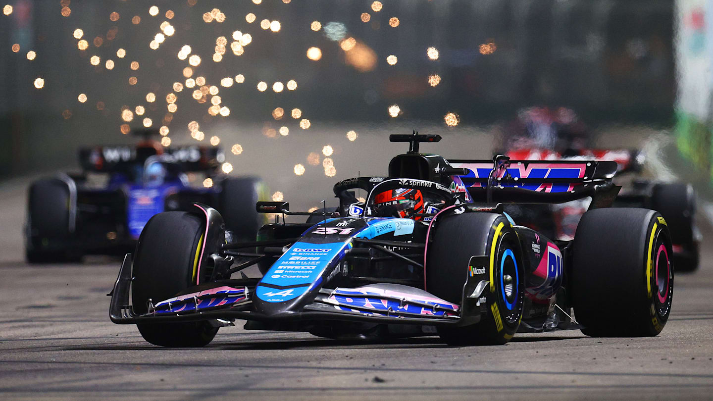 SINGAPORE, SINGAPORE - SEPTEMBER 22: Esteban Ocon of France driving the (31) Alpine F1 A524 Renault