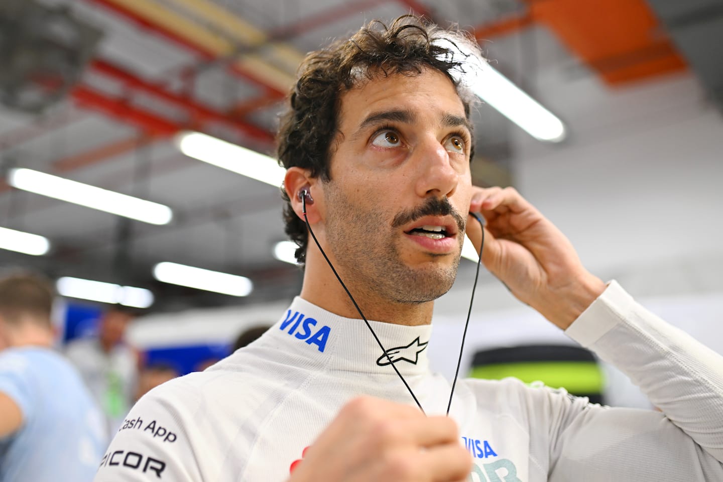SINGAPORE, SINGAPORE - SEPTEMBER 22: Daniel Ricciardo of Australia and Visa Cash App RB prepares in